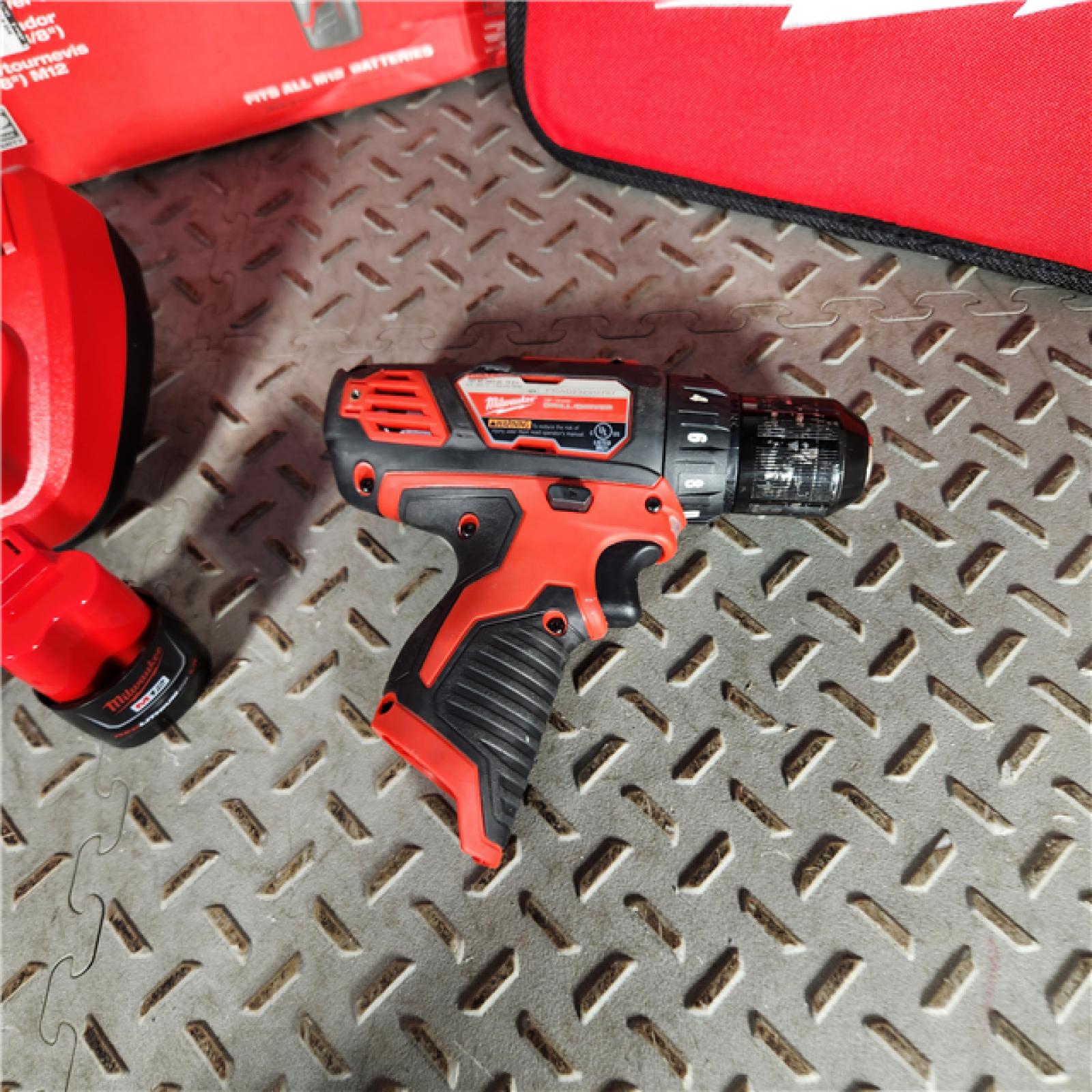Houston location- AS-IS MLW2407-22 Milwaukee M12 0.37 in. Cordless Drill Driver with Batteries Kit