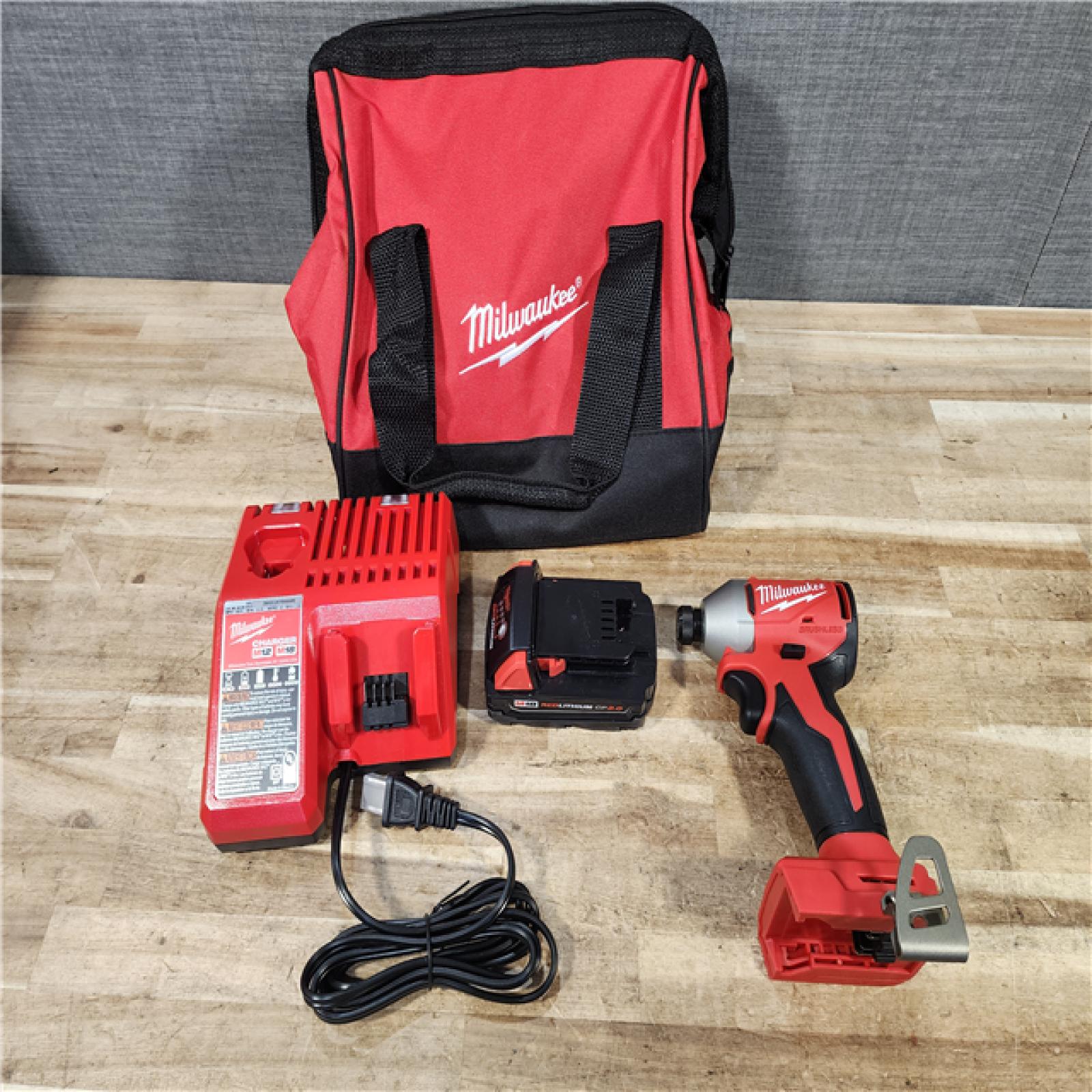 HOUSTON LOCATION - AS - IS Milwaukee 18-Volt Lithium-Ion Compact Brushless Cordless 1/4 in. Impact Driver Kit