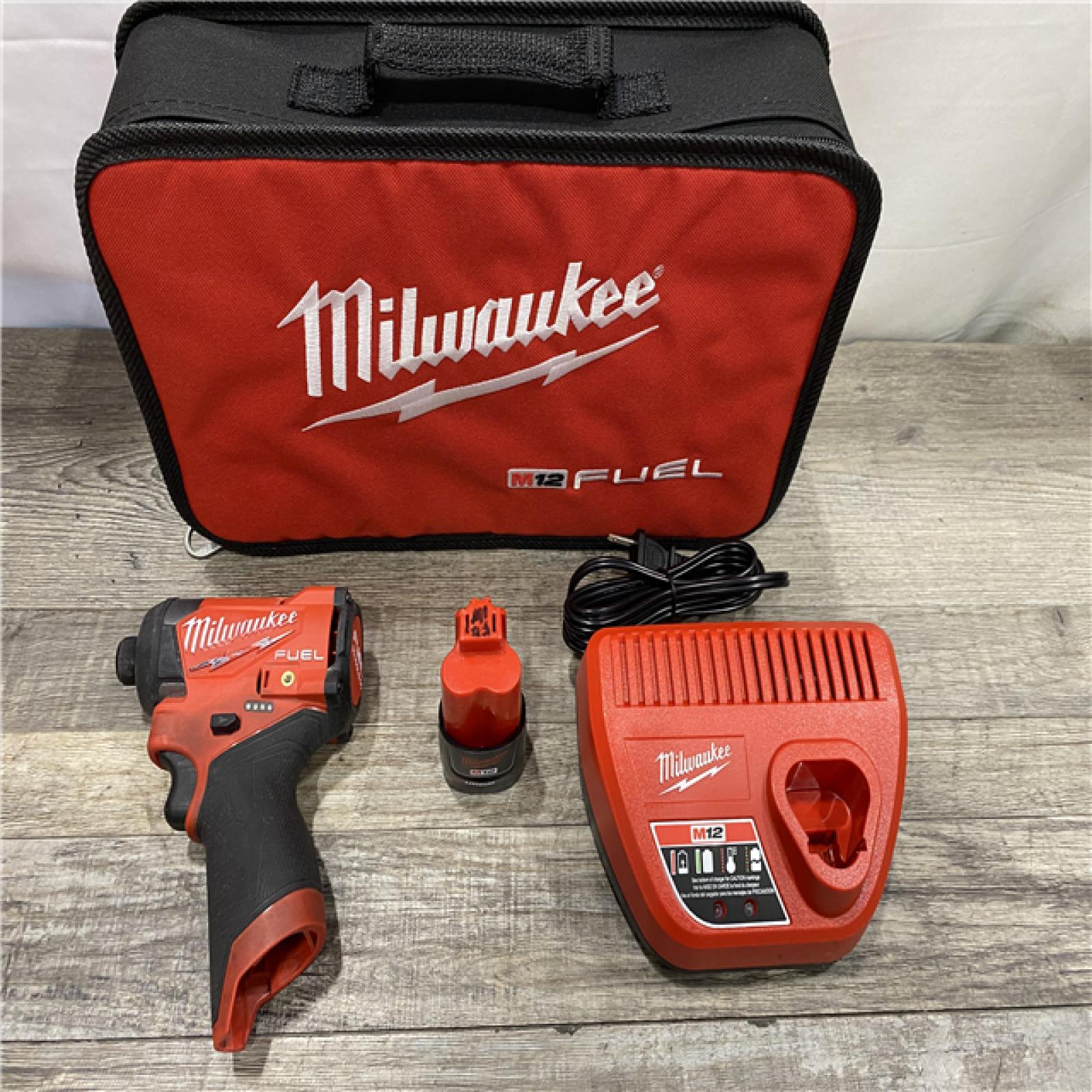 AS-IS Milwaukee FUEL 12-Volt Lithium-Ion Brushless Cordless 1/4 in. Hex Impact Driver Compact Kit