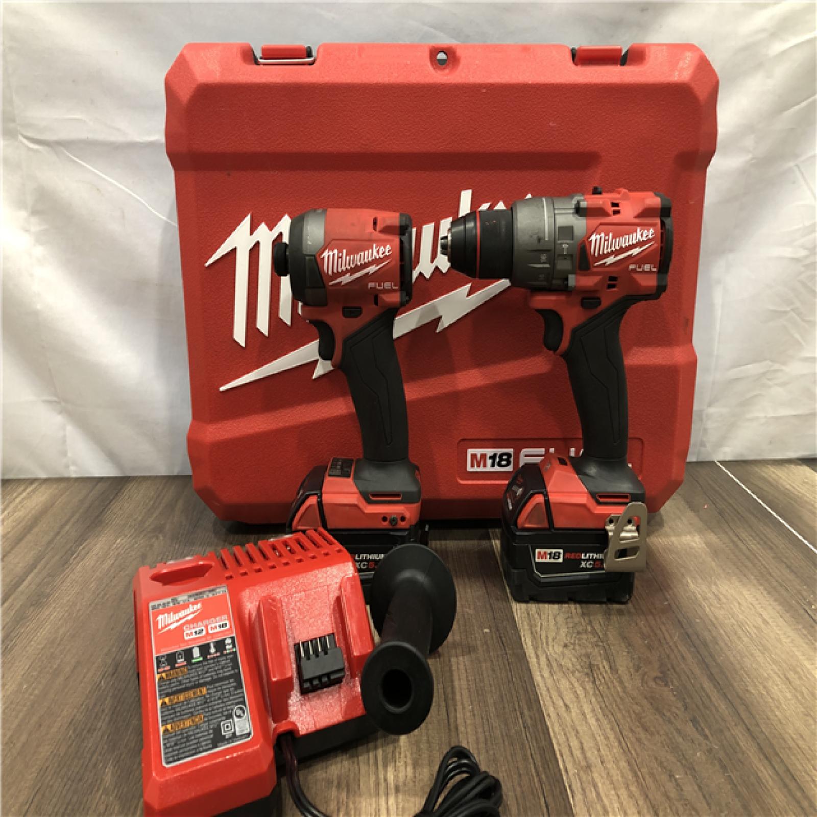 AS-IS Milwaukee FUEL 18V Lithium-Ion Brushless Cordless Hammer Drill and Impact Driver Combo Kit