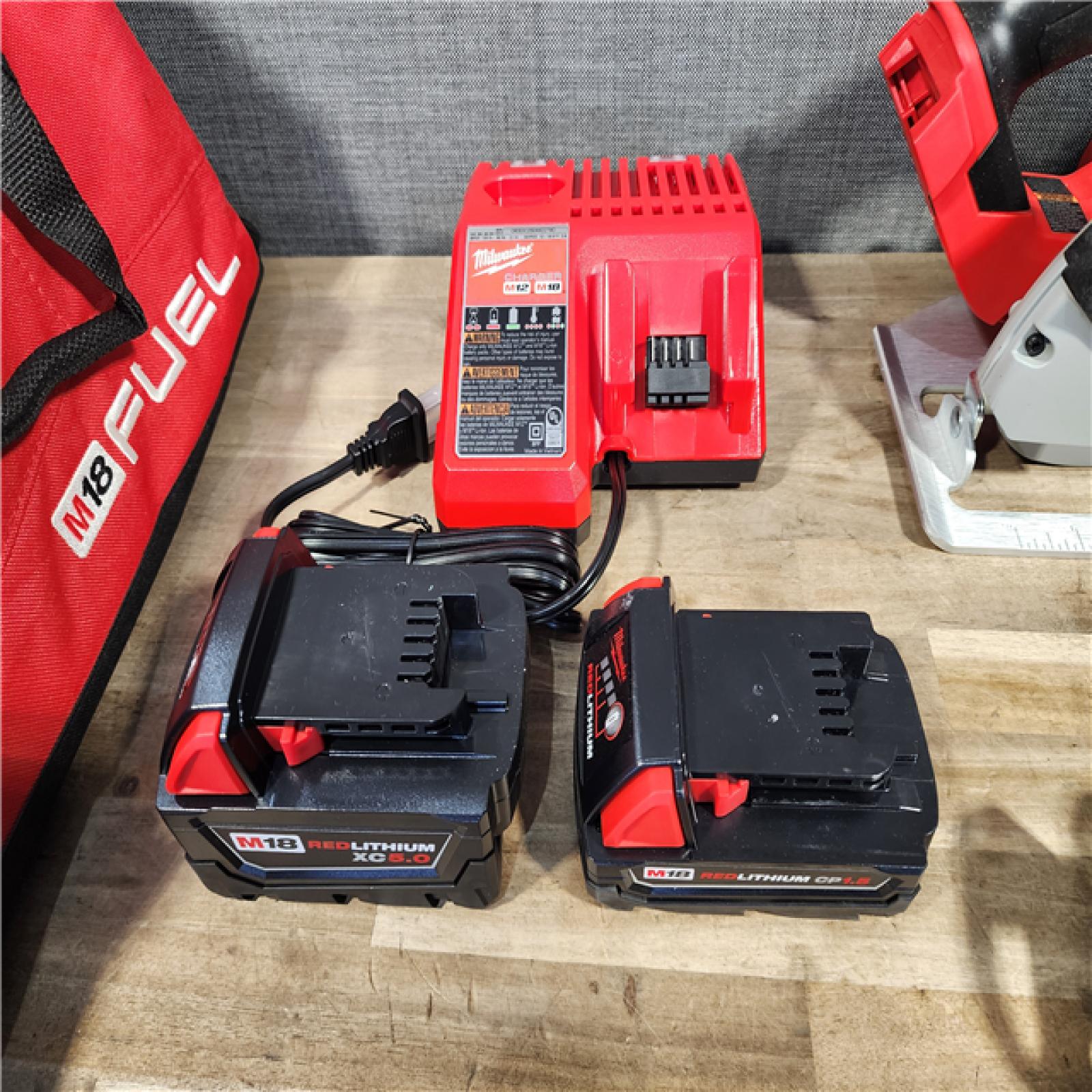HOUSTON LOCATION - AS-IS Milwaukee M18 18-Volt Lithium-Ion Brushless Cordless Combo Kit (3-Tool) with 2-Batteries, 1-Charger and Tool Bag