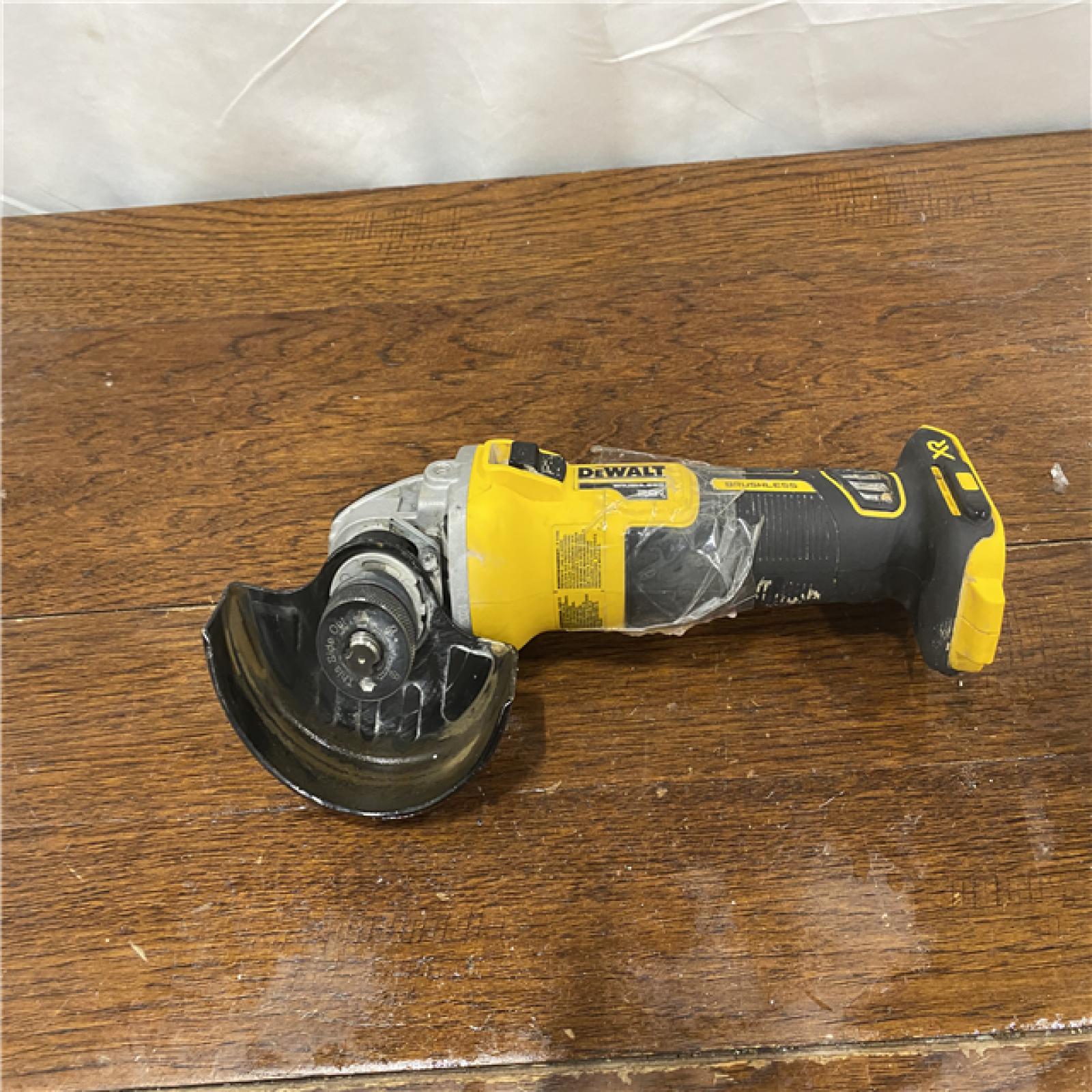 AS-IS DeWalt DCG405B 20V Max XR 4.5-Inch Slide Switch Small Angle Grinder (Tool Only)