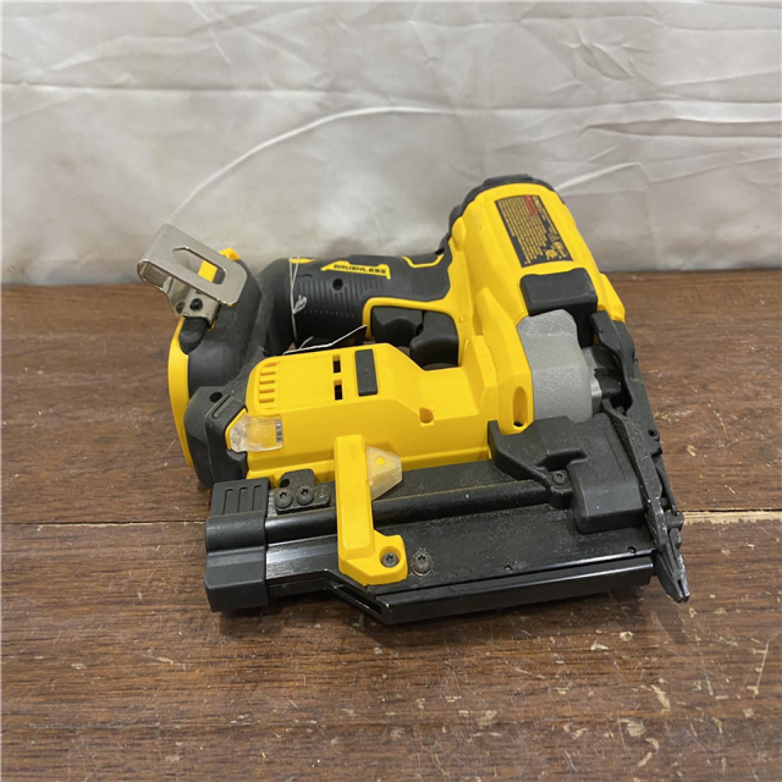 AS-IS DEWALT ATOMIC 20V MAX Lithium Ion Cordless 23 Gauge Pin Nailer Kit with 3.0Ah Battery and Charger