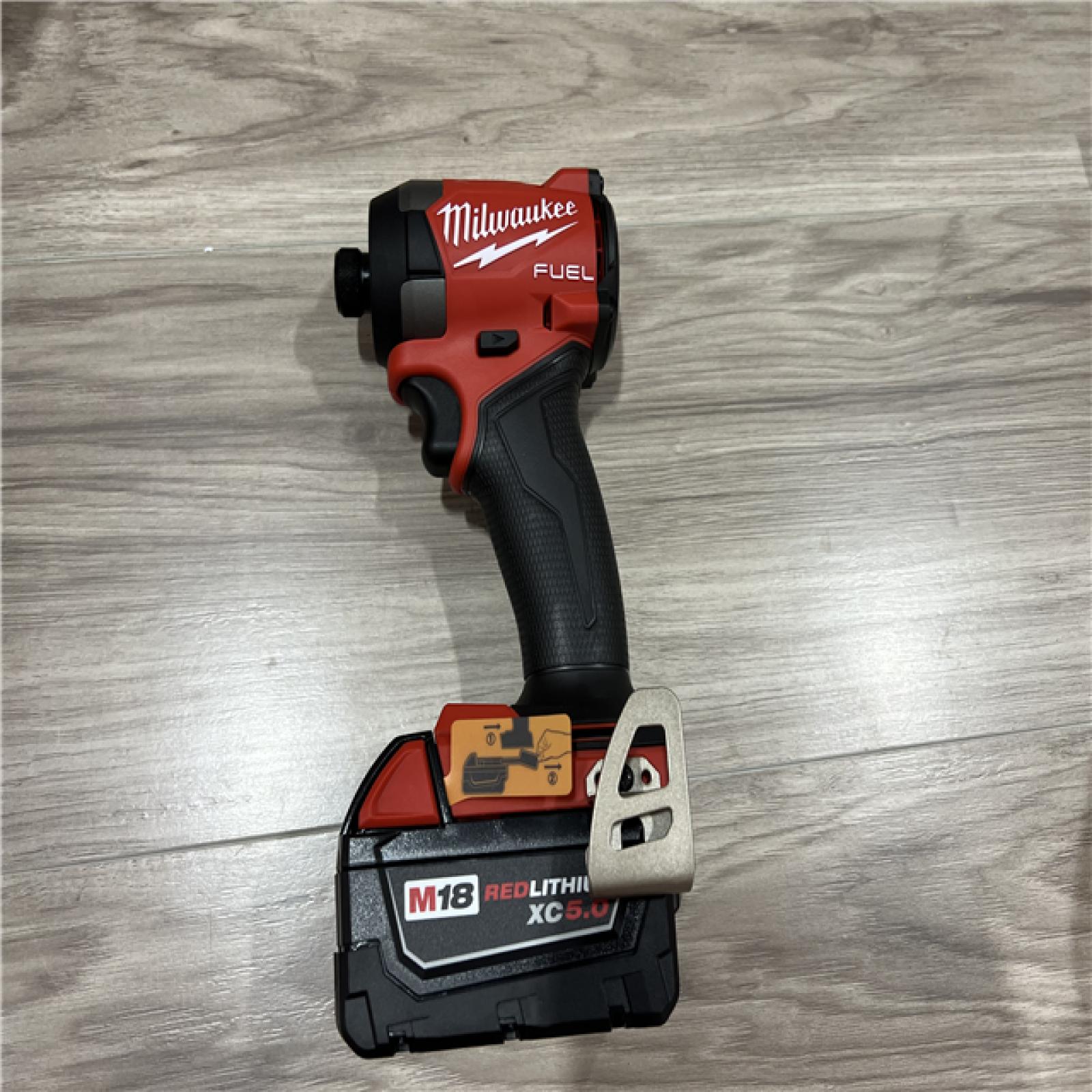 AS-IS Milwaukee FUEL 18V Lithium-Ion Brushless Cordless 1/4 in. Hex Impact Driver Kit