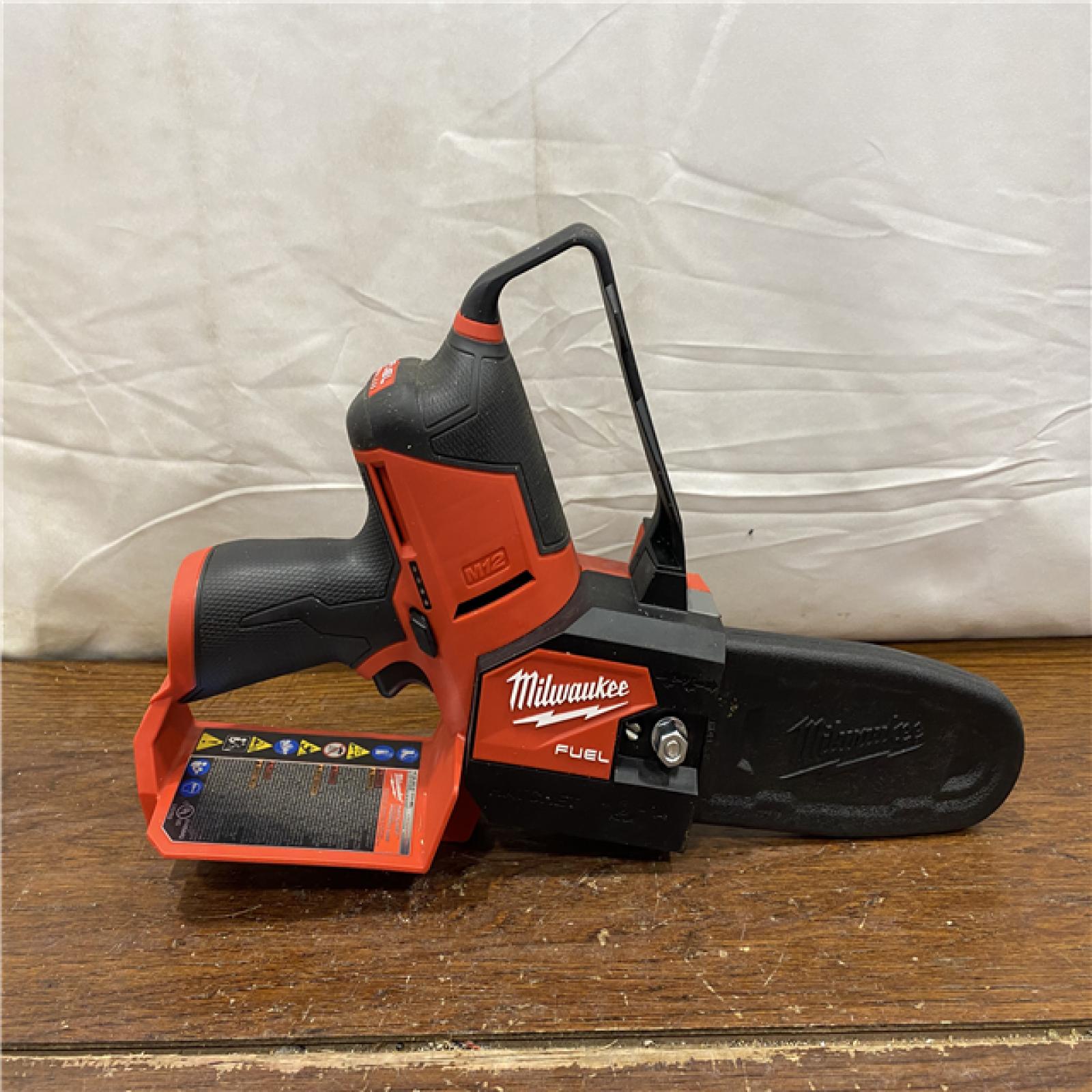 AS-IS Milwaukee-2527-21 M12 FUEL HATCHET 6in. Pruning Saw Kit