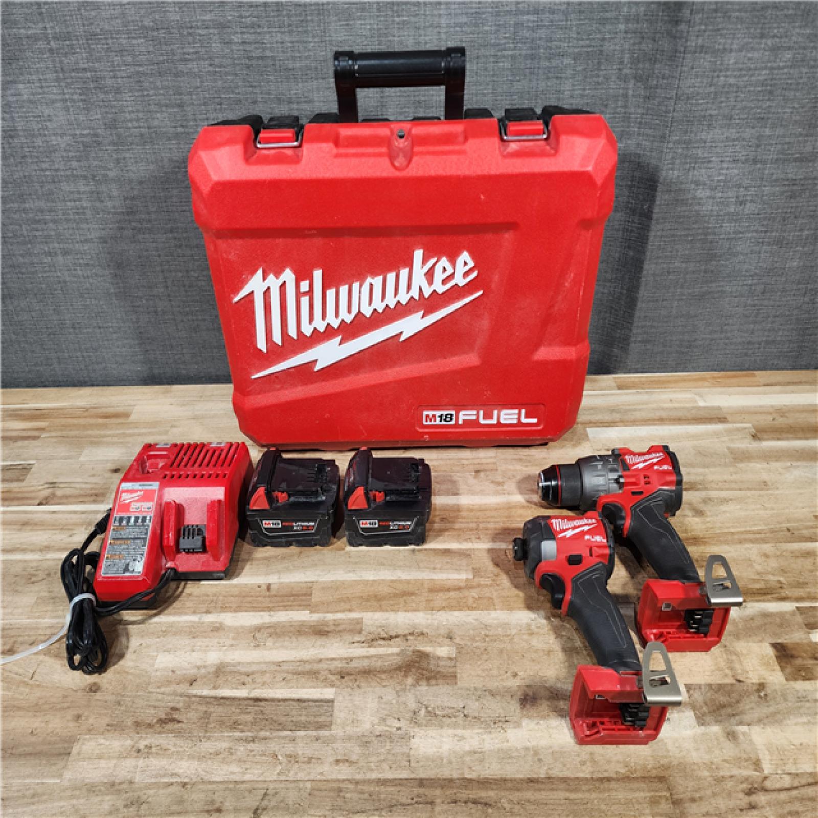 HOUSTON LOCATION - AS-IS Milwaukee FUEL 18V Lithium-Ion Brushless Cordless Hammer Drill and Impact Driver Combo Kit