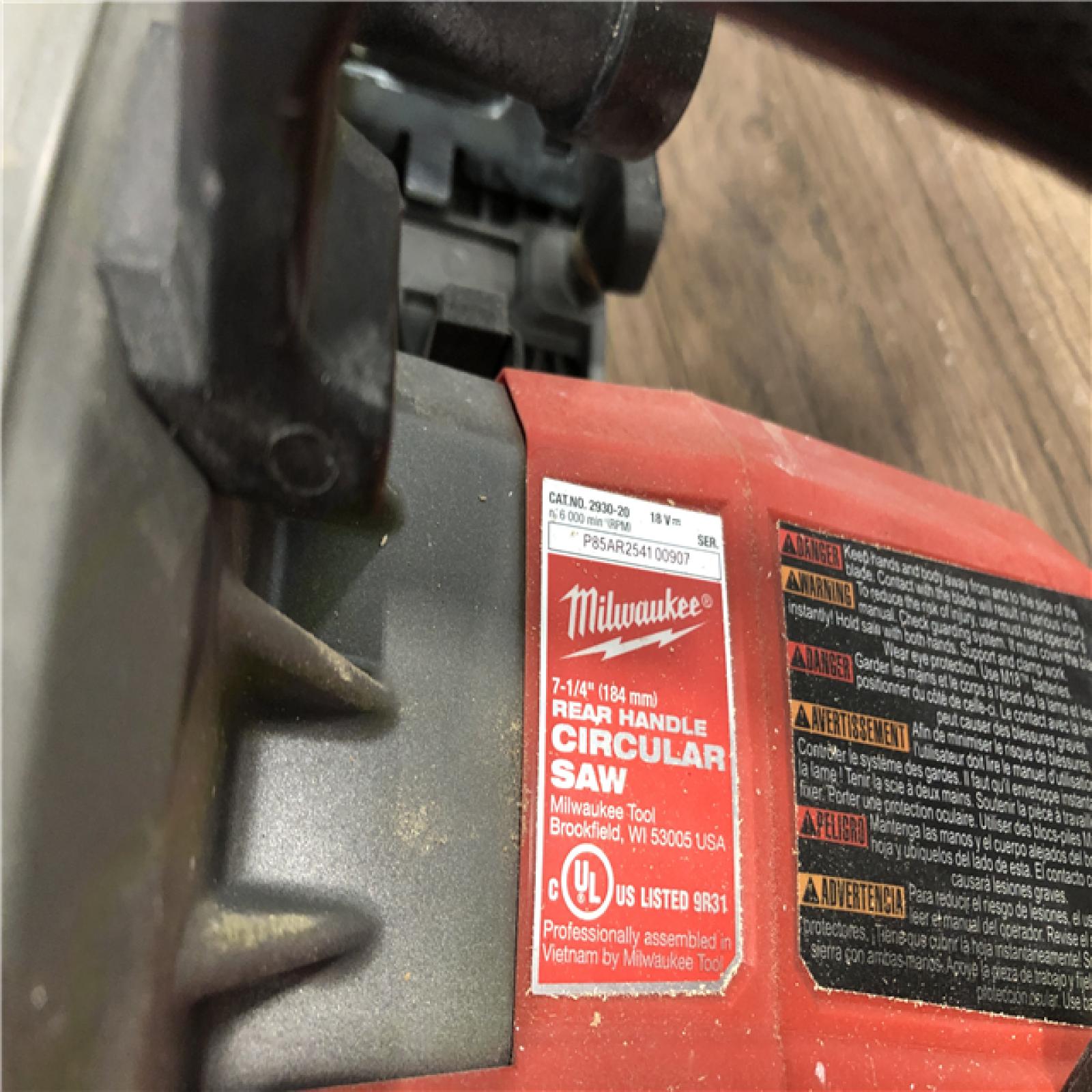 AS-IS Milwaukee FUEL 18V Lithium-Ion Cordless 7-1/4 in. Rear Handle Circular Saw (Tool-Only)