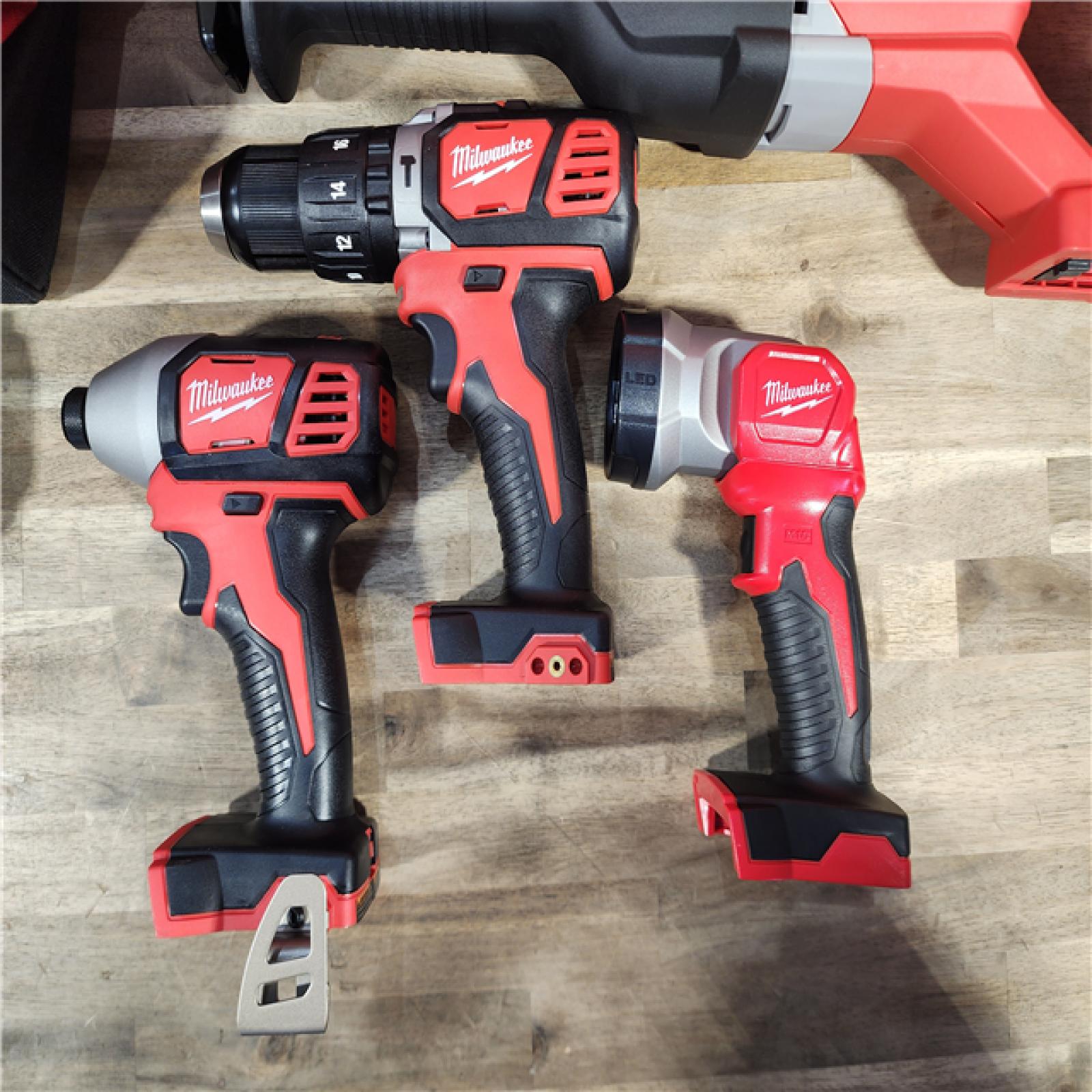 HOUSTON LOCATION - AS-IS (APPEARS LIKE NEW) MILWAUKEE M18 18V Lithium-Ion Cordless Combo Tool Kit with Two 3.0Ah Batteries, 1-Charger, 1-Tool Bag (4-Tool)