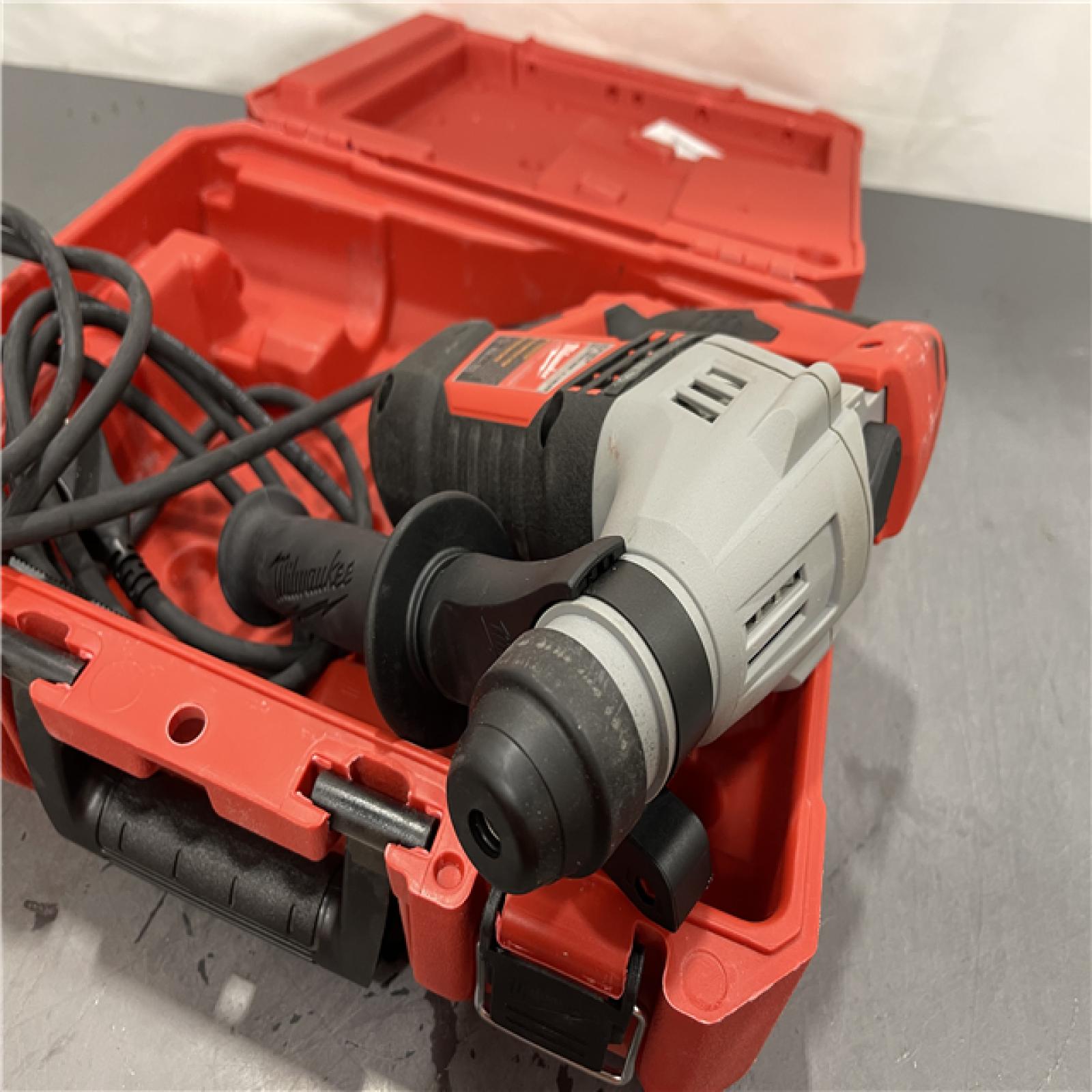 AS-IS - Milwaukee 5.5 Amp 5/8 in. Corded SDS-plus Concrete/Masonry Rotary Hammer Drill Kit with Case