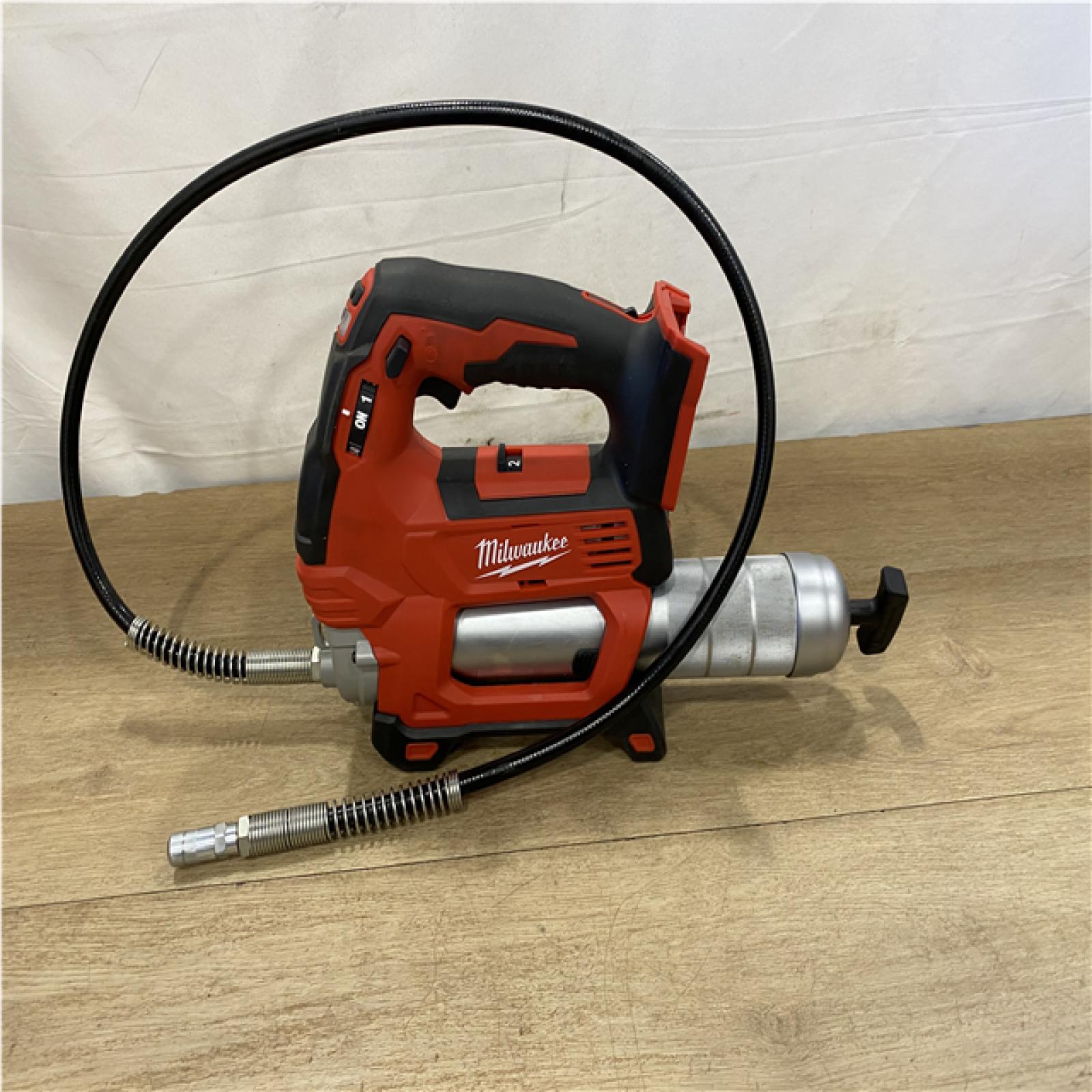 AS-IS - Milwaukee 18V Lithium-Ion Cordless Grease Gun 2-Speed (Tool-Only)