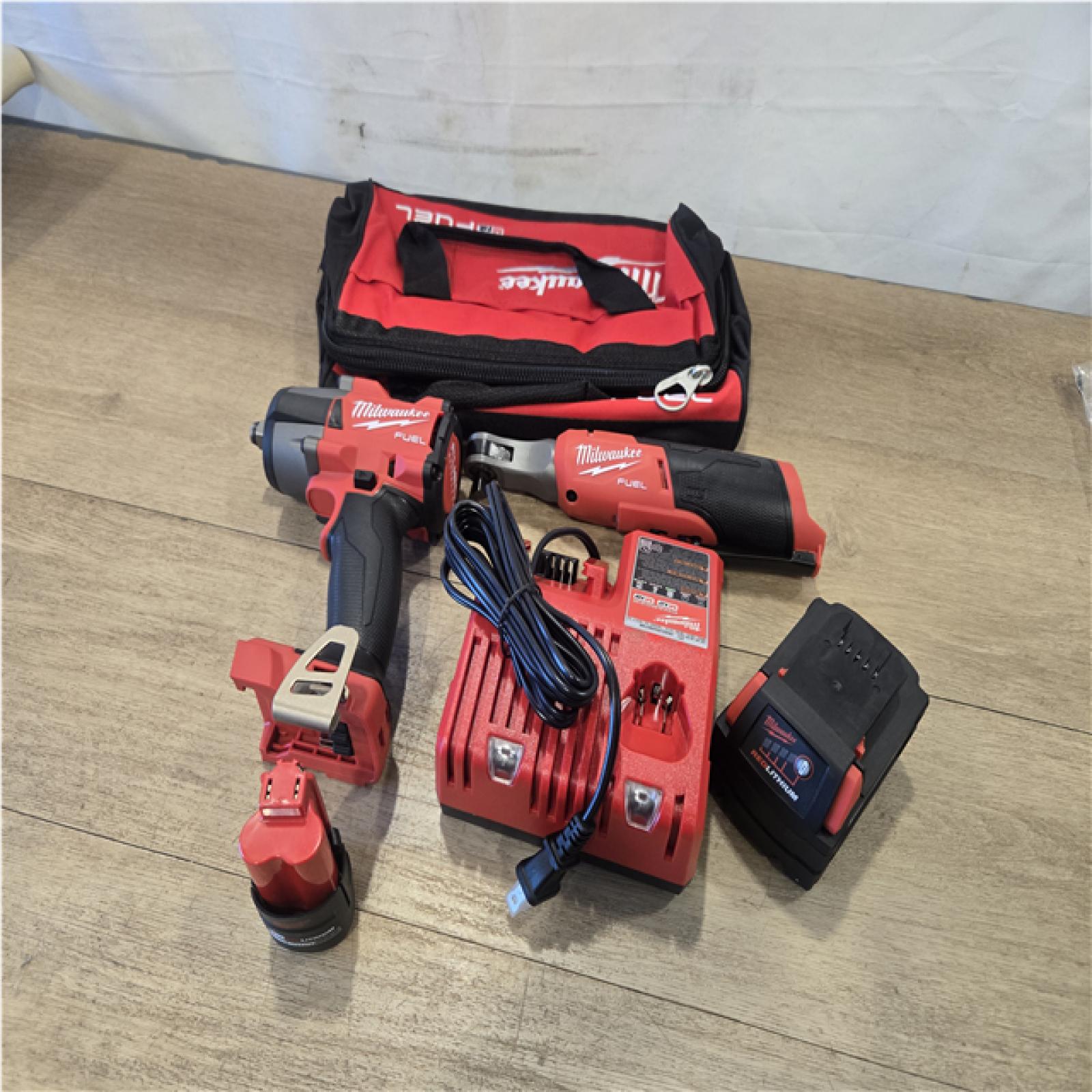 AS-IS - Milwaukee FUEL 18V Cordless Mid Torque 1/2 in. Impact Wrench w/ 12 FUEL 3/8 in. Ratchet Combo Kit