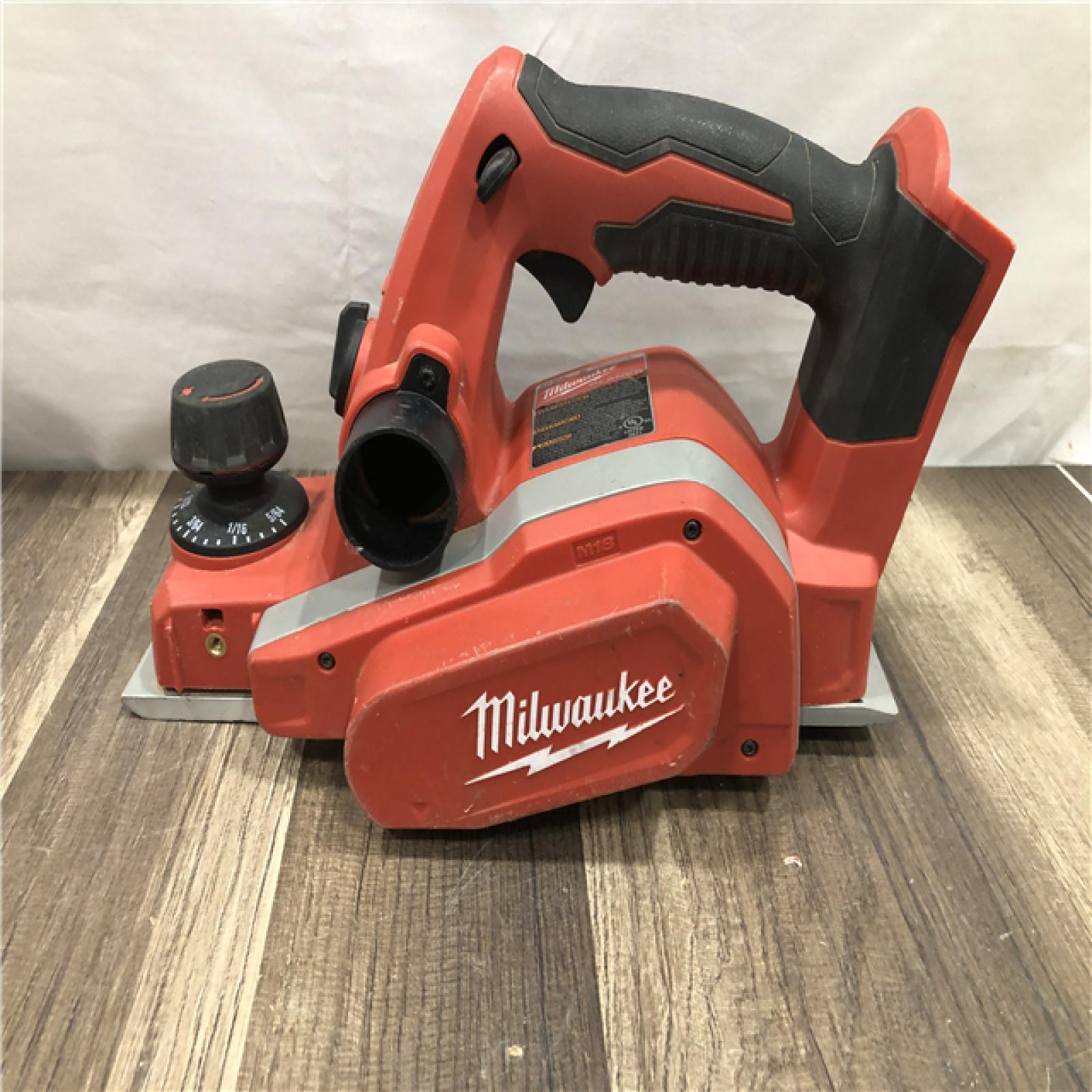 AS-IS Milwaukee M18 18V Lithium-Ion Cordless 3-1/4 in. Planer (Tool-Only)