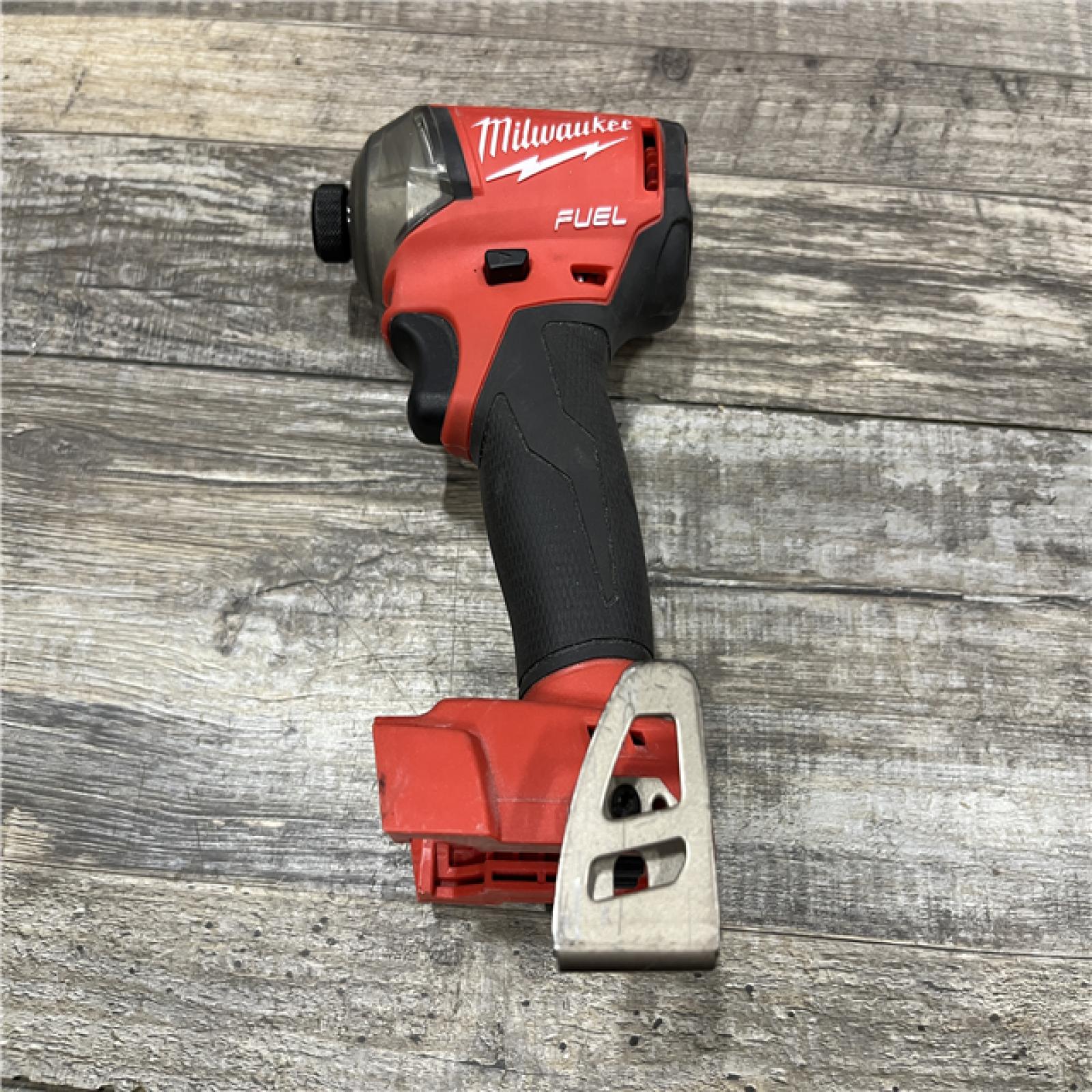 AS-IS Milwaukee FUEL SURGE 18-Volt Lithium-Ion Brushless Cordless 1/4 in. Hex Impact Driver Compact Kit