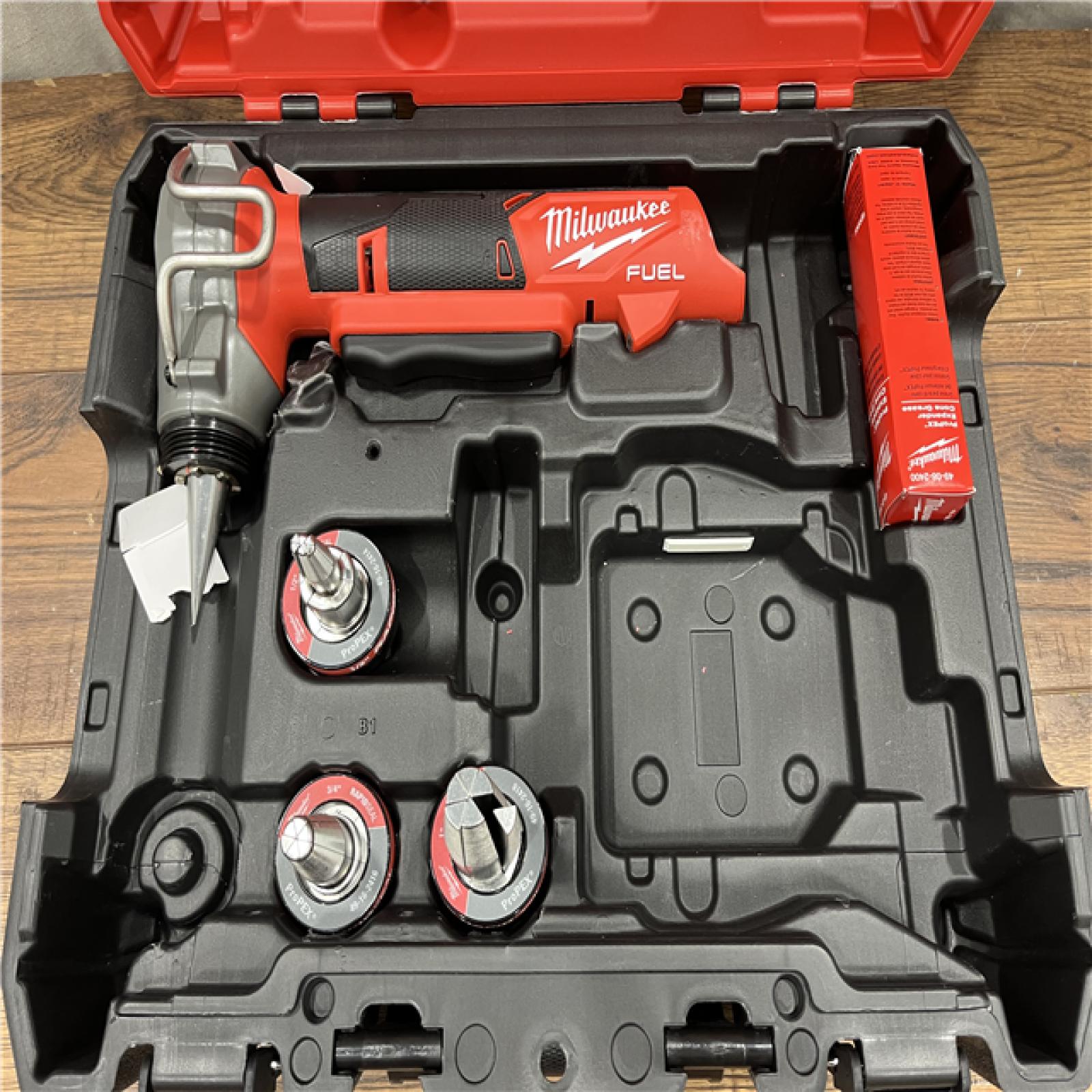 AS-IS MILWAUKEE M12 FUEL ProPEX Expander Tool with 1/2 in. - 1 in. RAPID SEAL ProPEX Expander Heads