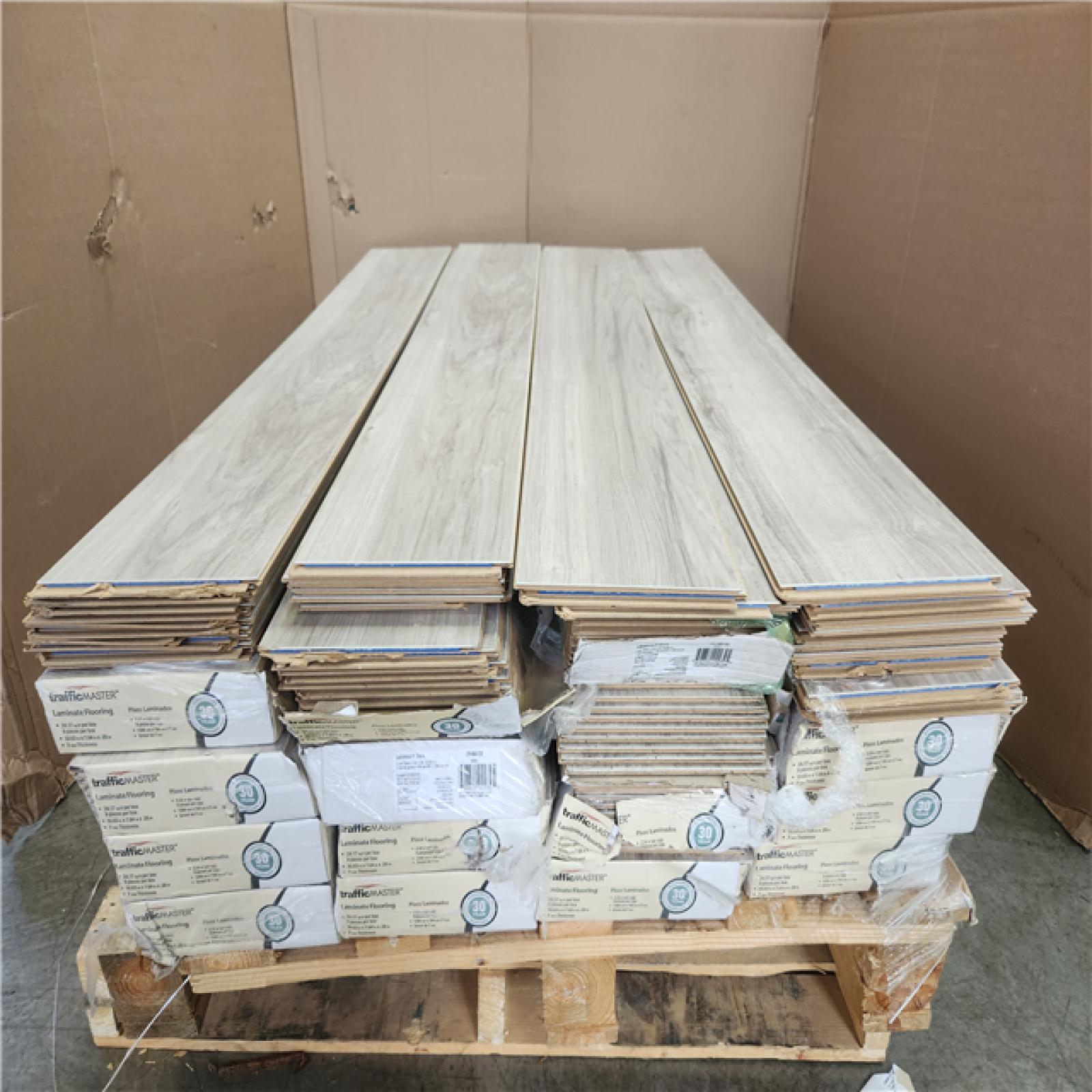 Phoenix AS-IS TrafficMaster Lakeshore Pecan Stone 7 mm T x 7.6 in. W Laminate Wood Flooring (488 sqft/20 case)