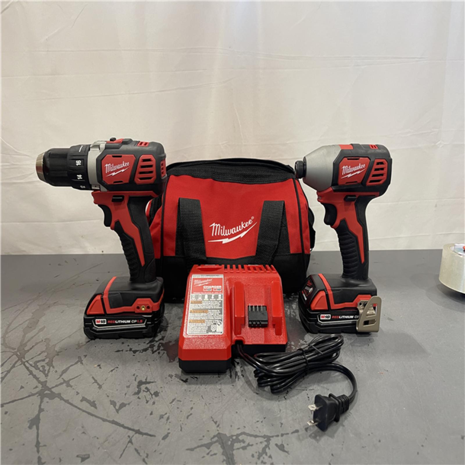 AS-IS- Milwaukee 18V Cordless Brushed 2-Tool Drill/Driver and Impact Driver Kit