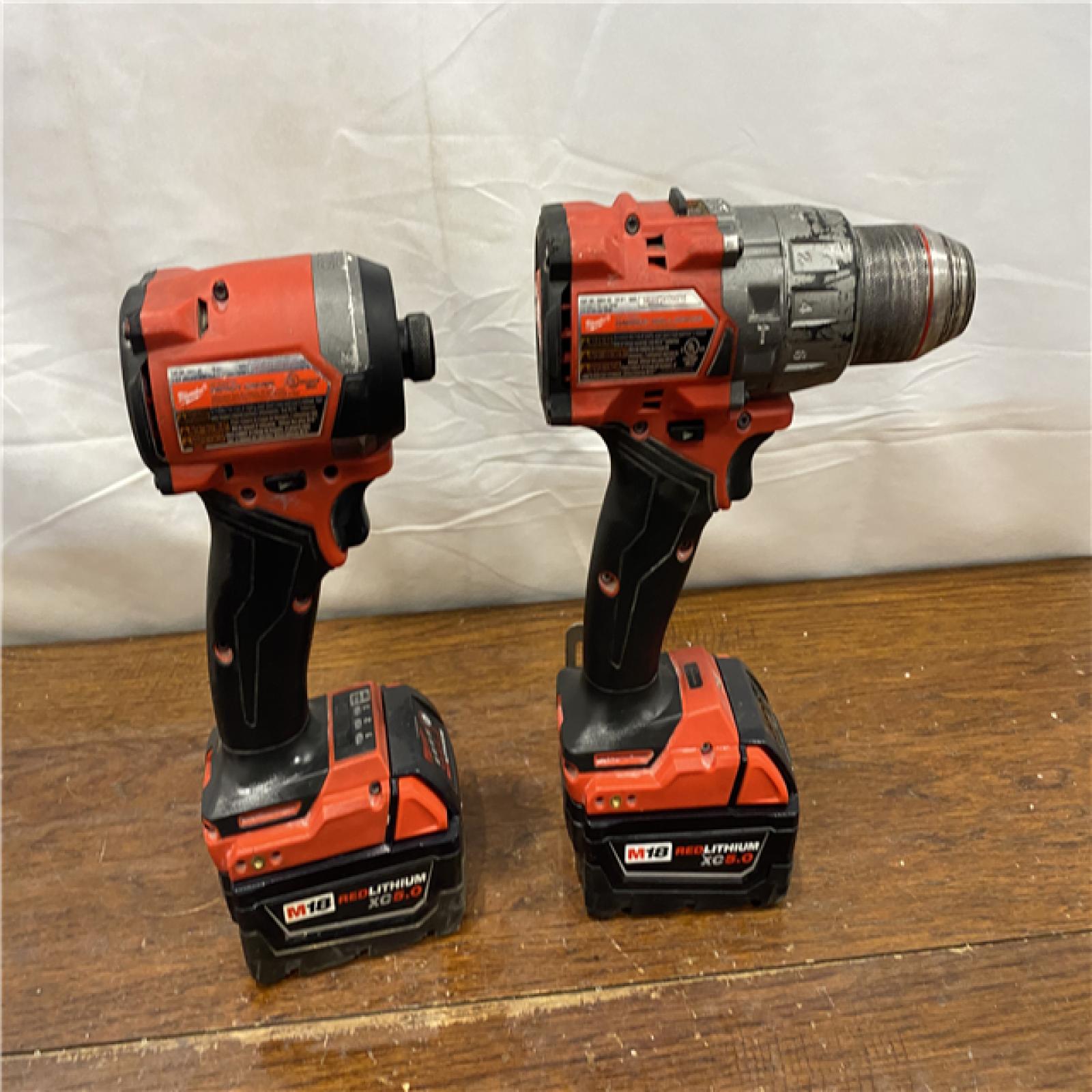 AS-IS M18 FUEL 18V Lithium-Ion Brushless Cordless Hammer Drill and Impact Driver Combo Kit (2-Tool) with 2 Batteries