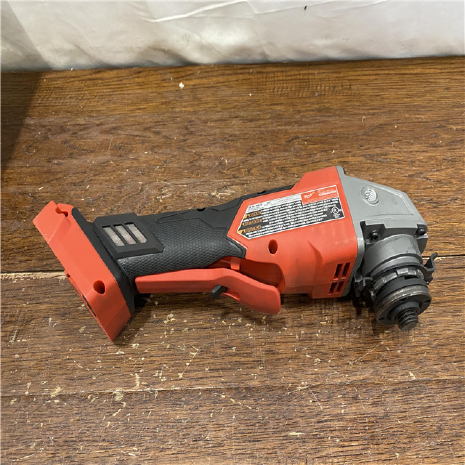 AS-IS AS-IS Milwaukee 2880-20 M18 FUEL 18-Volt Lithium-Ion Brushless Cordless 4-1/2 in./5 in. Grinder W/Paddle Switch (Tool-Only)