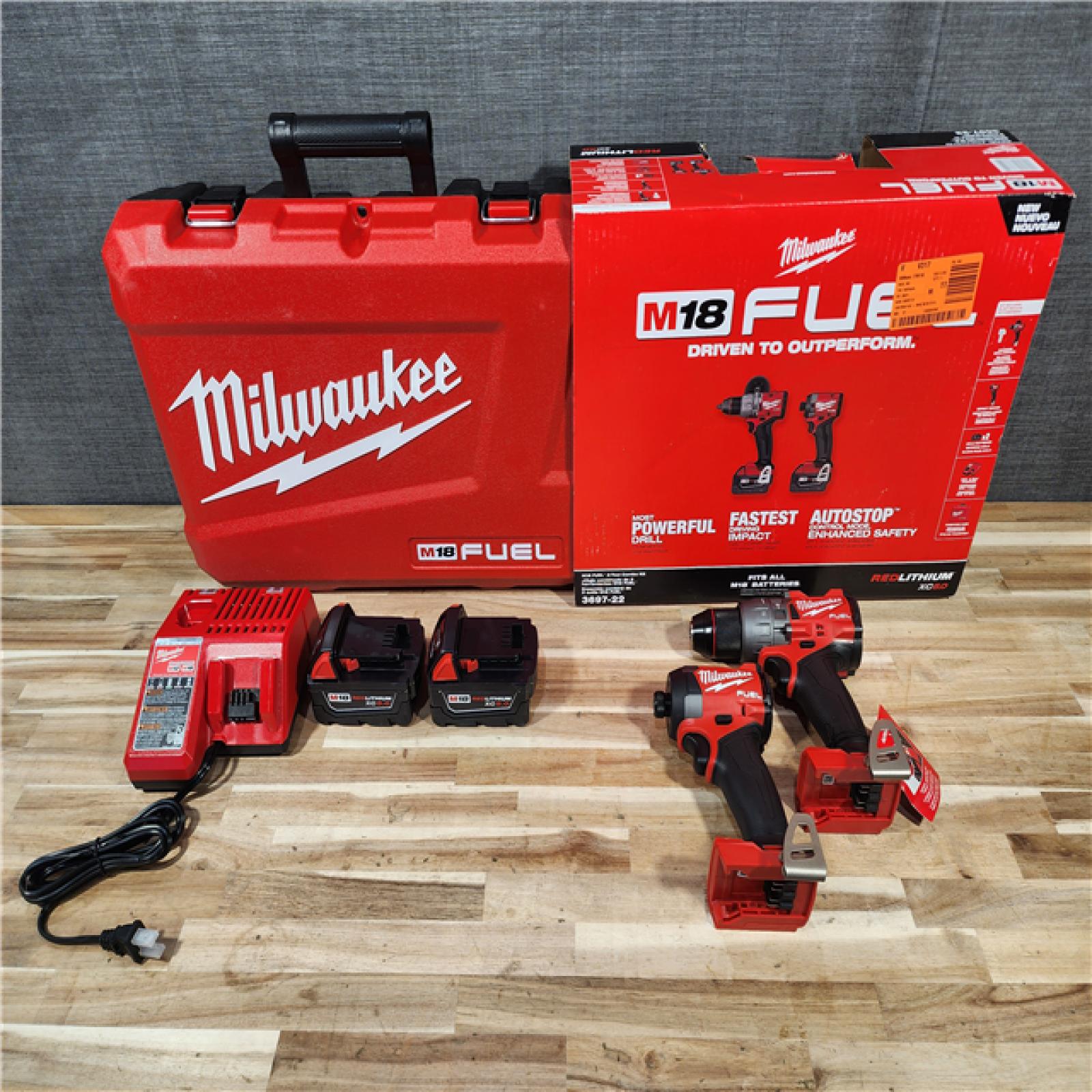 HOUSTON LOCATION - AS-IS (APPEARS LIKE NEW) Milwaukee  FUEL 18V Lithium-Ion Brushless Cordless Hammer Drill and Impact Driver Combo Kit