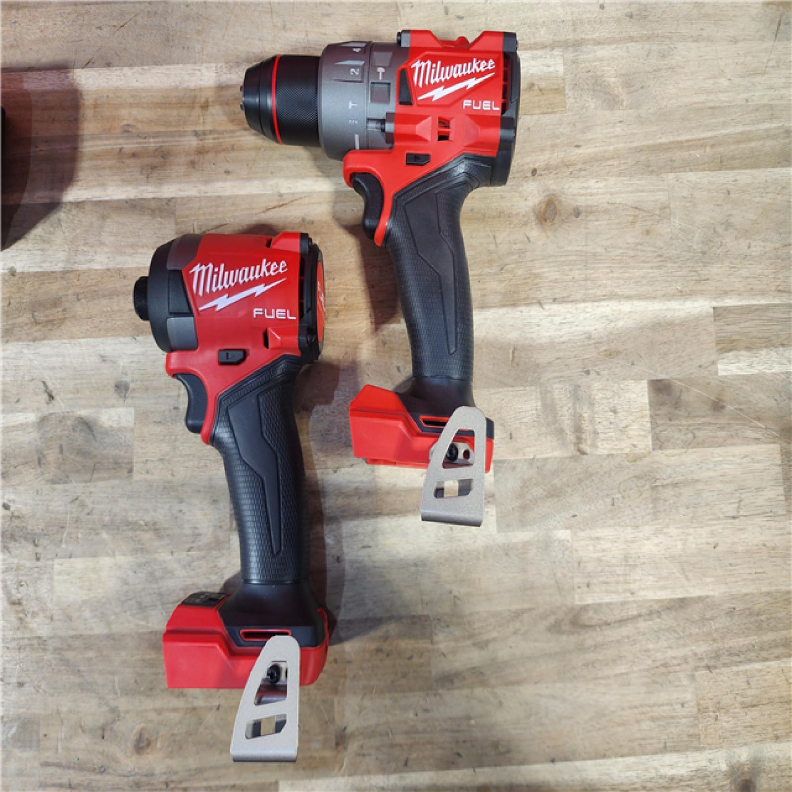 HOUSTON LOCATION - AS-IS (APPEARS LIKE NEW) MILWAUKEE FUEL 18V Lithium-Ion Brushless Cordless Hammer Drill and Impact Driver Combo Kit (2-Tool) with 2 Batteries