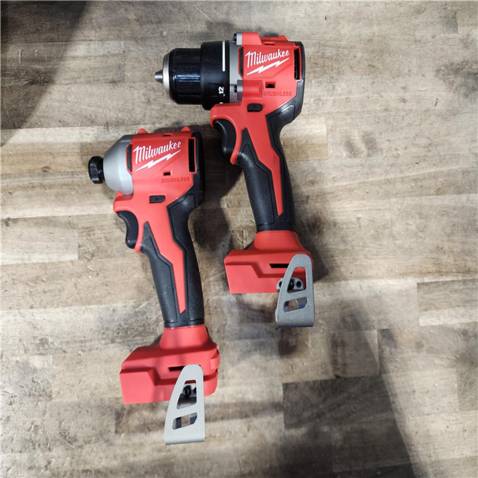 HOUSTON LOCATION - AS-IS Milwaukee M18 18V Lithium-Ion Brushless Cordless Compact Drill/Impact Combo Kit (2-Tool) W/(2) 2.0 Ah Batteries  Charger & Bag