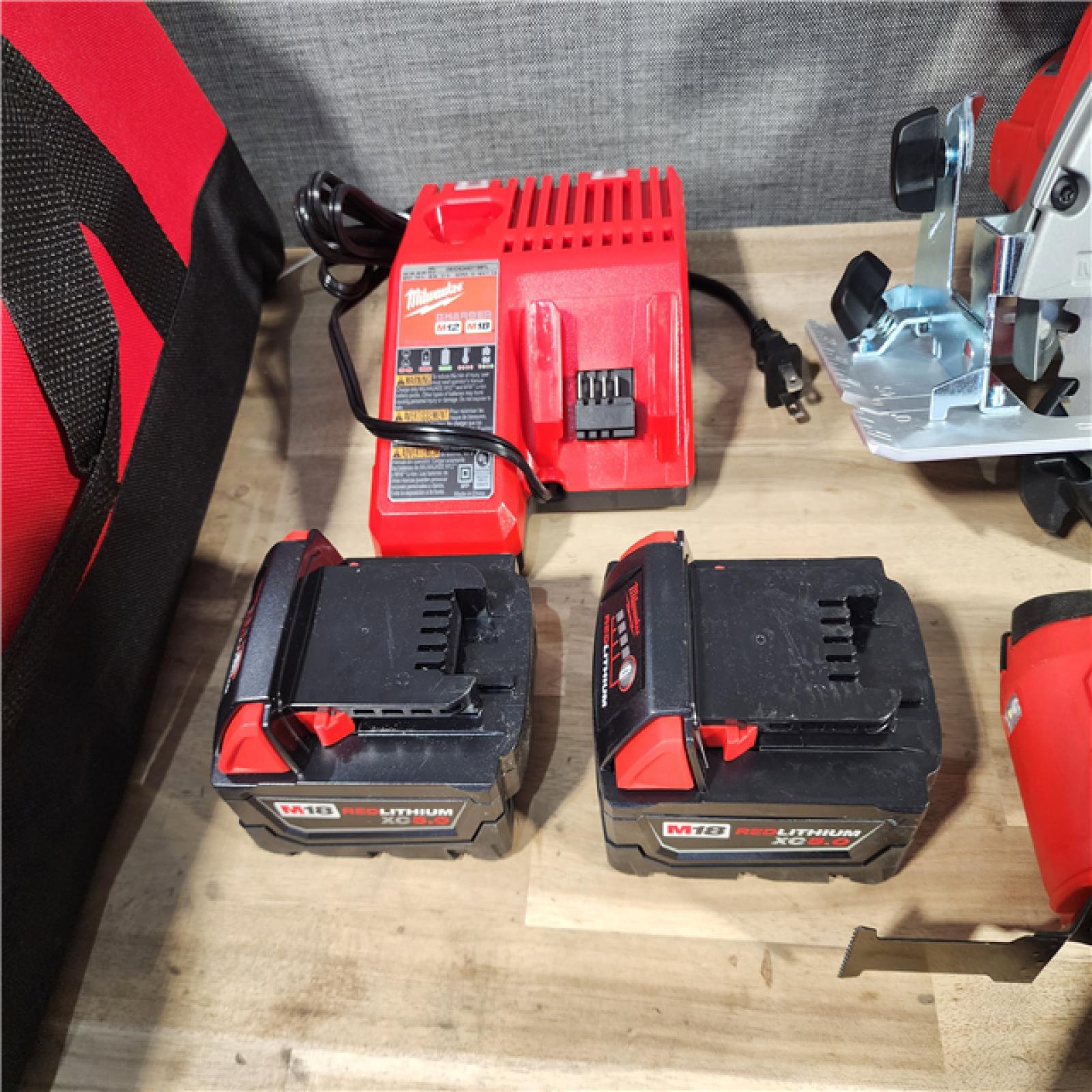 HOUSTON LOCATION - AS-IS Milwaukee M18 18-Volt Lithium-Ion Cordless Combo Kit 7-Tool with 2-Batteries, Charger and Tool Bag