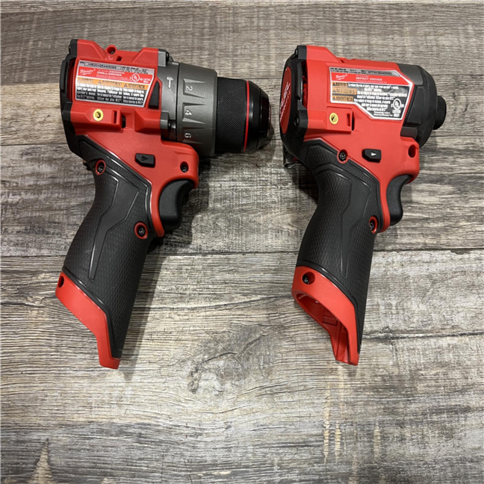 AS-IS Milwaukee FUEL 12-Volt Lithium-Ion Brushless Cordless Hammer Drill and Impact Driver Combo Kit