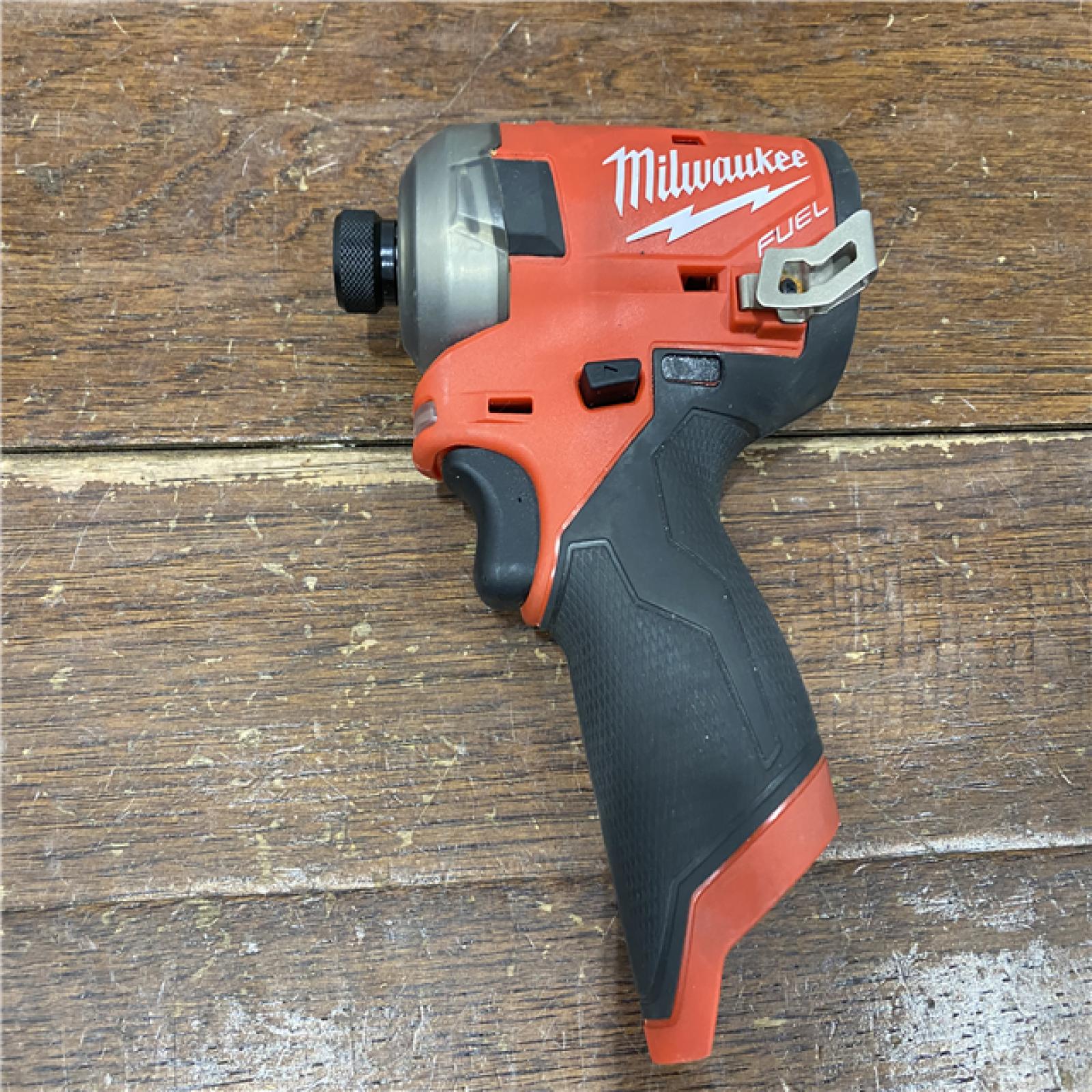 AS-IS M12 FUEL SURGE 12V Lithium-Ion Brushless Cordless 1/4 in. Hex Impact Driver Compact Kit W/Two 2.0Ah Batteries, Bag