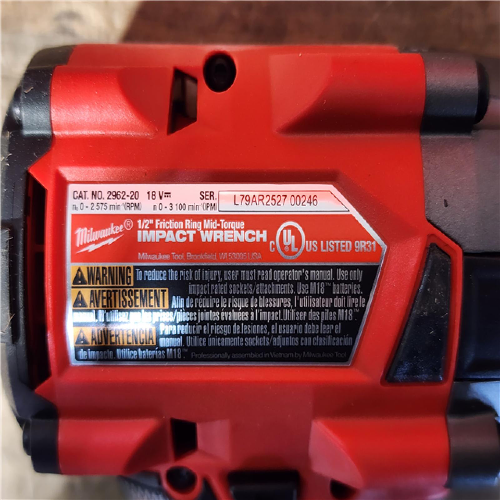 HOUSTON LOCATION - AS-IS (APPEARS LIKE NEW) Milwaukee 2962-20  M18 18V Fuel 1/2 Mid-Torque Impact Wrench Cordless Lithium-Ion Brushless (Tool-Only)
