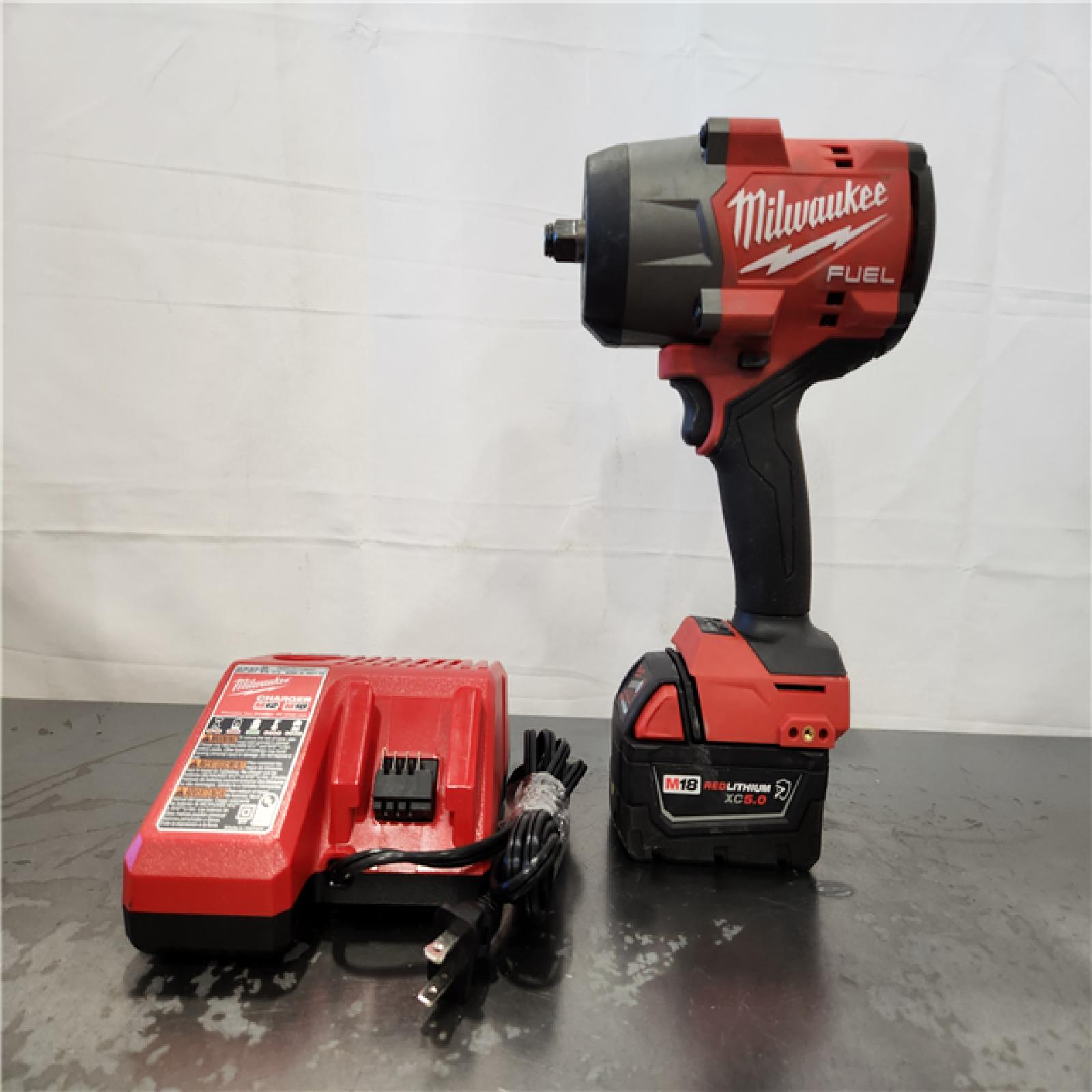 AS-IS- Milwaukee M18 FUEL 18V Lithium-Ion Brushless Cordless 1/2 in. Impact Wrench w/Friction Ring Kit