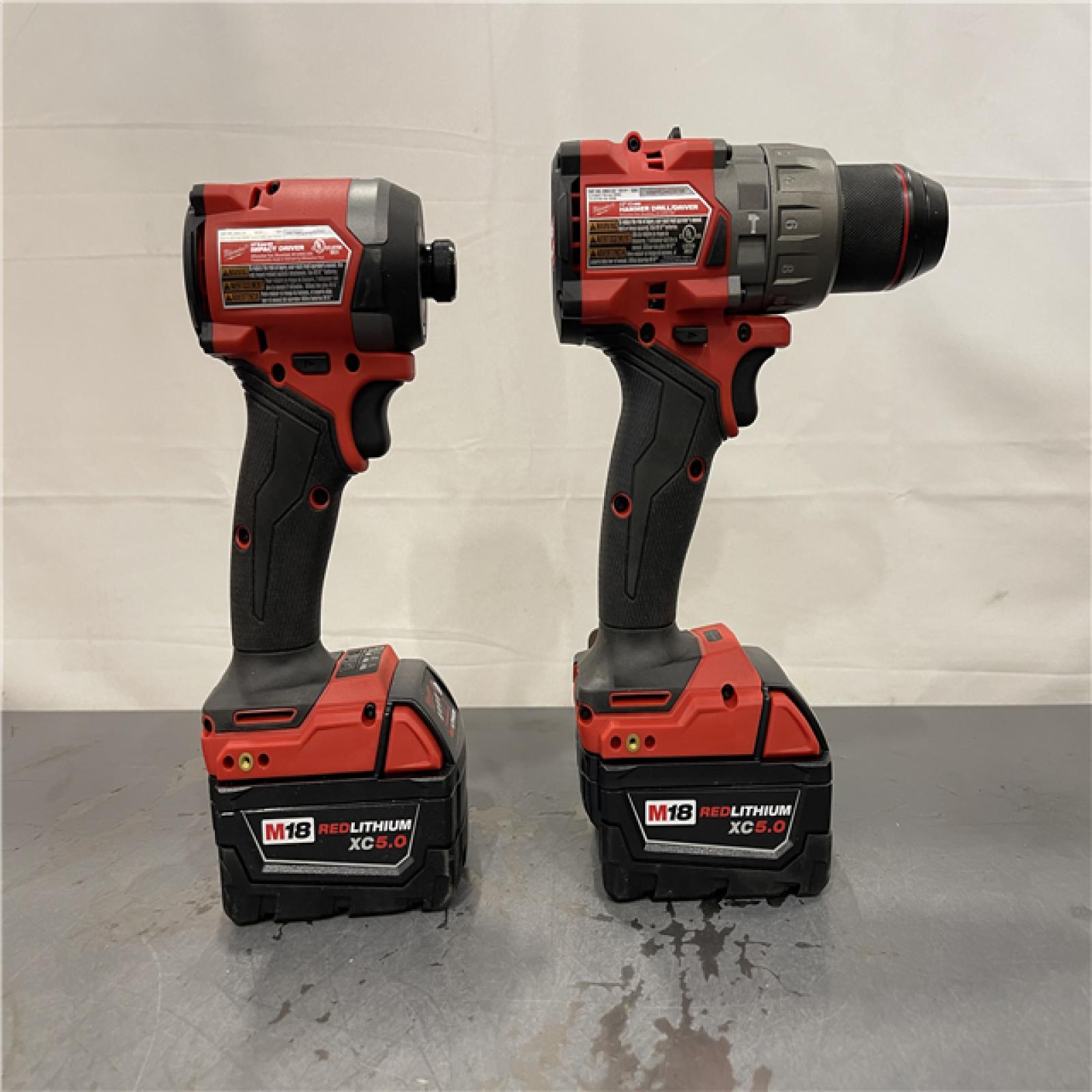 AS-IS - MILWAUKEE FUEL 18V Lithium-Ion Brushless Cordless Hammer Drill and Impact Driver Combo Kit