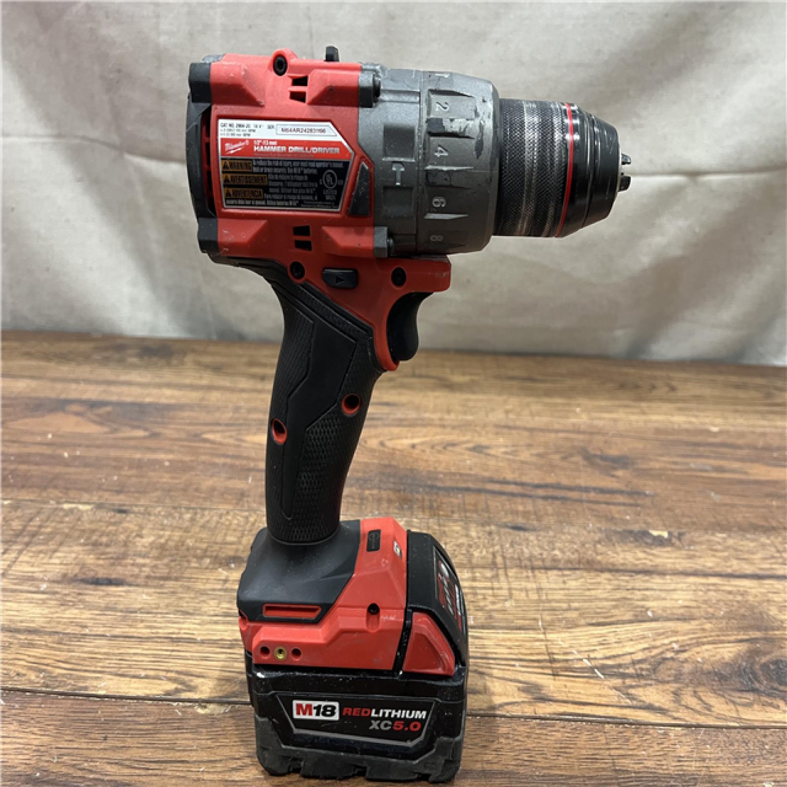 AS-IS MILWAUKEE M18 FUEL 18V Lithium-Ion Brushless Cordless Hammer Drill and Impact Driver Combo Kit (2-Tool) with 2 Batteries