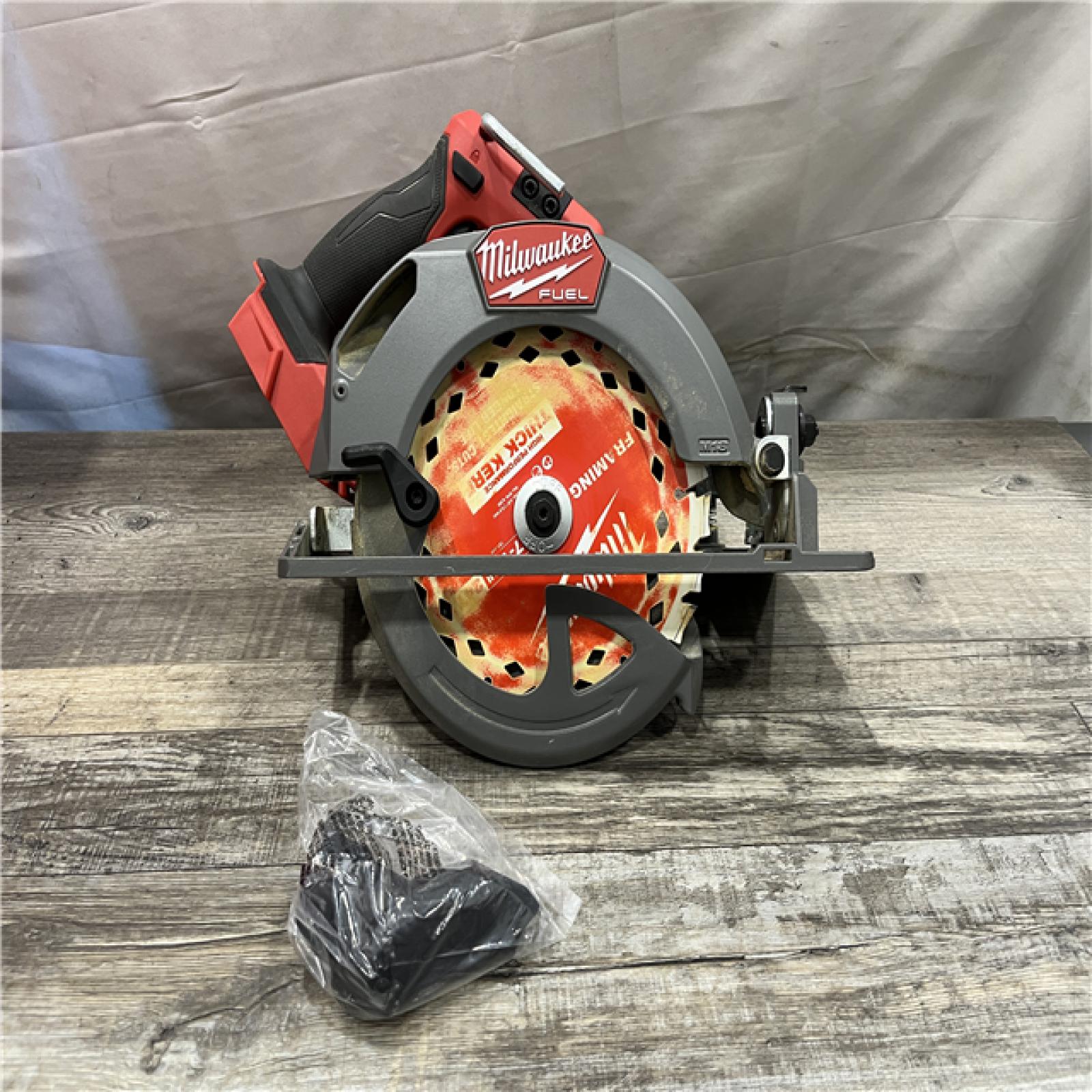 AS-IS Milwaukee FUEL 18V Lithium-Ion Brushless Cordless 7-1/4 in. Circular Saw (Tool-Only)
