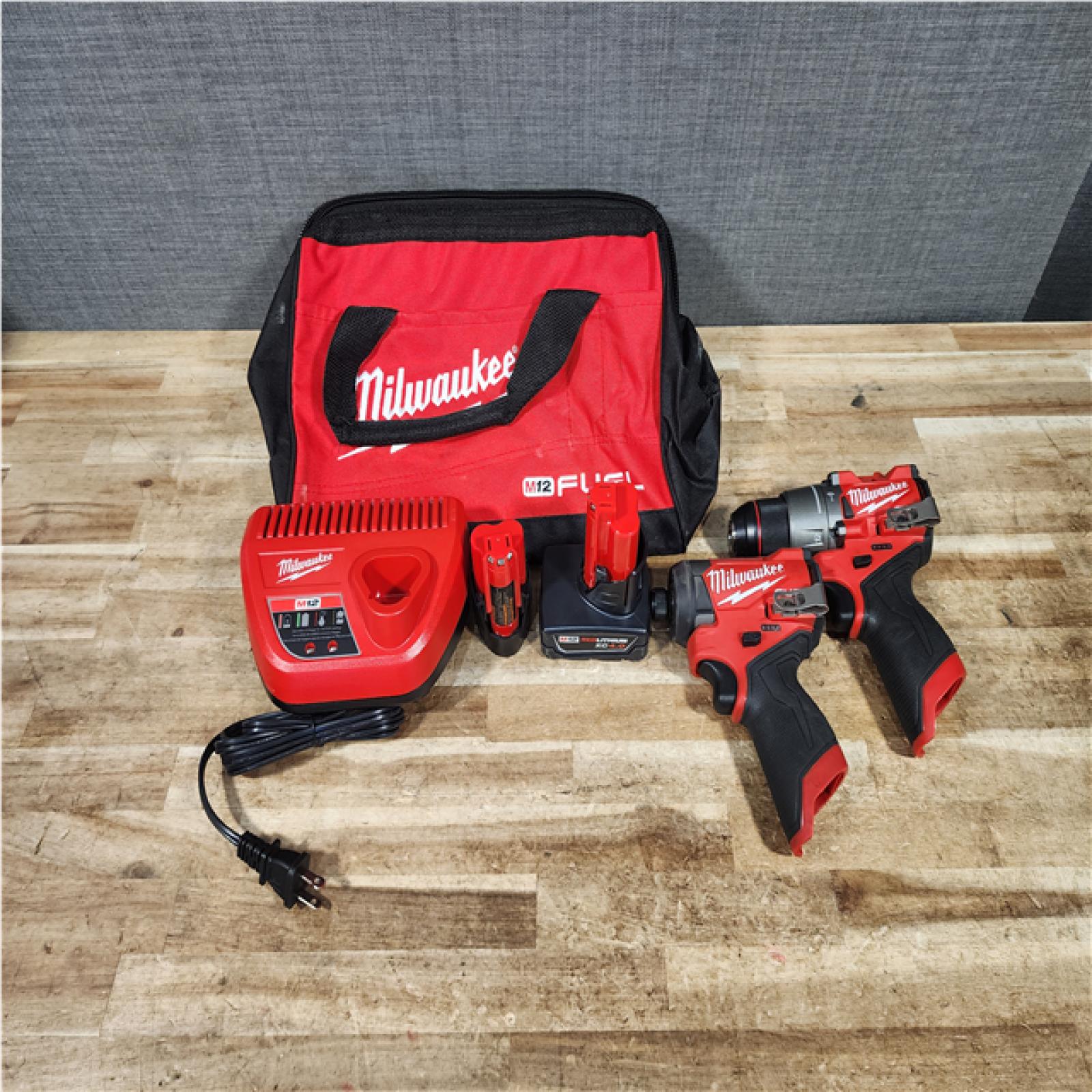 HOUSTON LOCATION - AS - IS Milwaukee FUEL 12-Volt Lithium-Ion Brushless Cordless Hammer Drill and Impact Driver Combo Kit