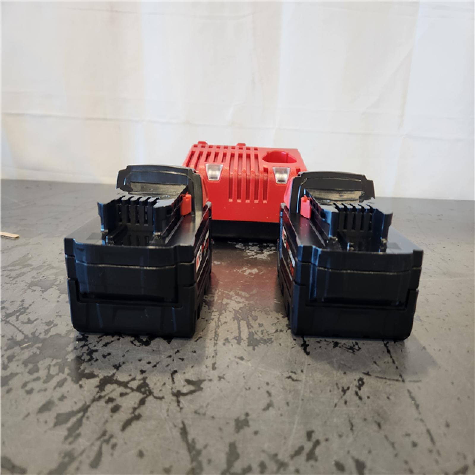 AS-IS- Milwaukee 18-Volt Lithium-Ion XC Starter Kit with Two 5.0Ah Batteries and Charger