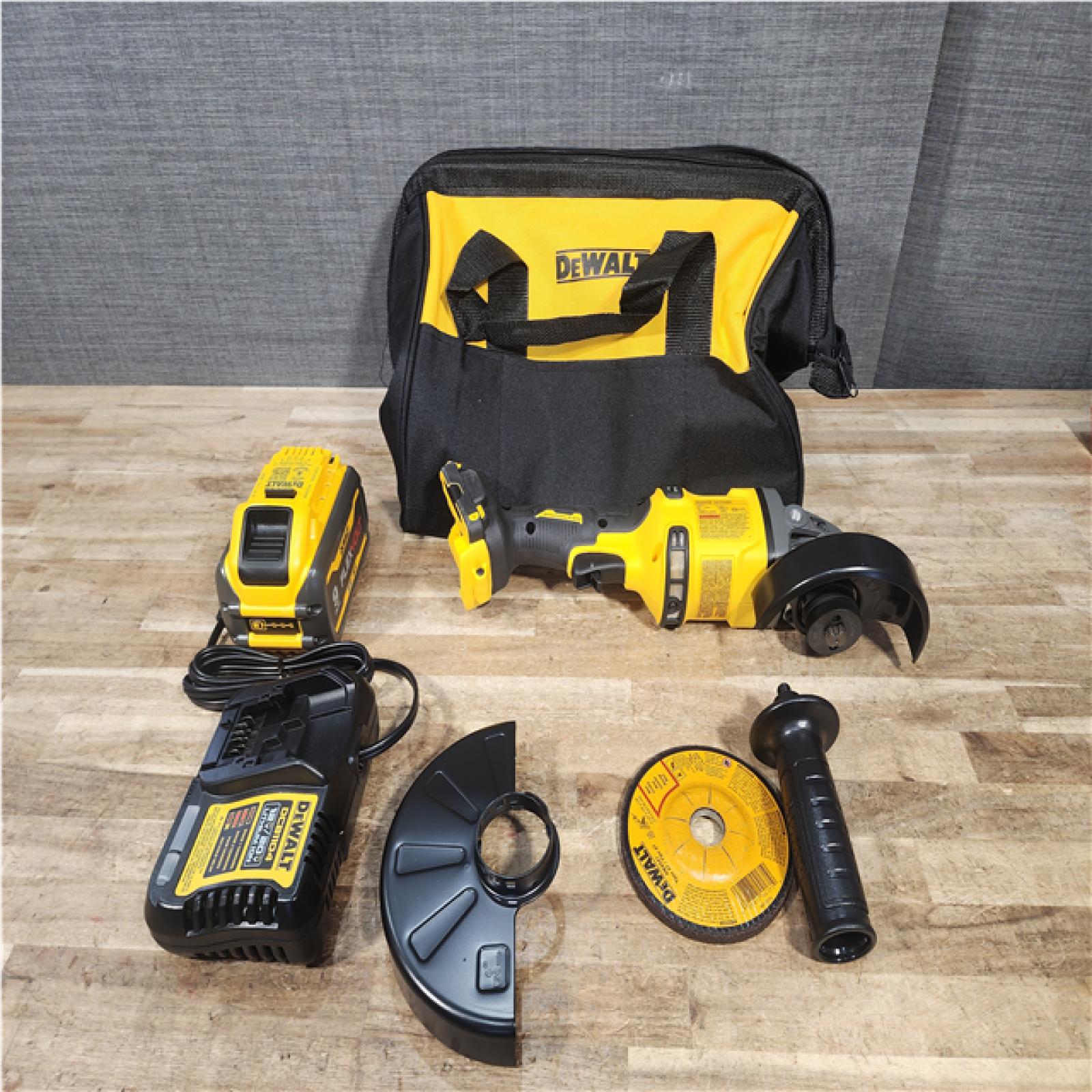 Houston Location AS-IS FLEXVOLT 60V MAX Lithium-Ion Brushless Cordless 4-1/2 in.-6 in. Grinder Kit with 9.0 Ah Battery  Charger and Kitbag