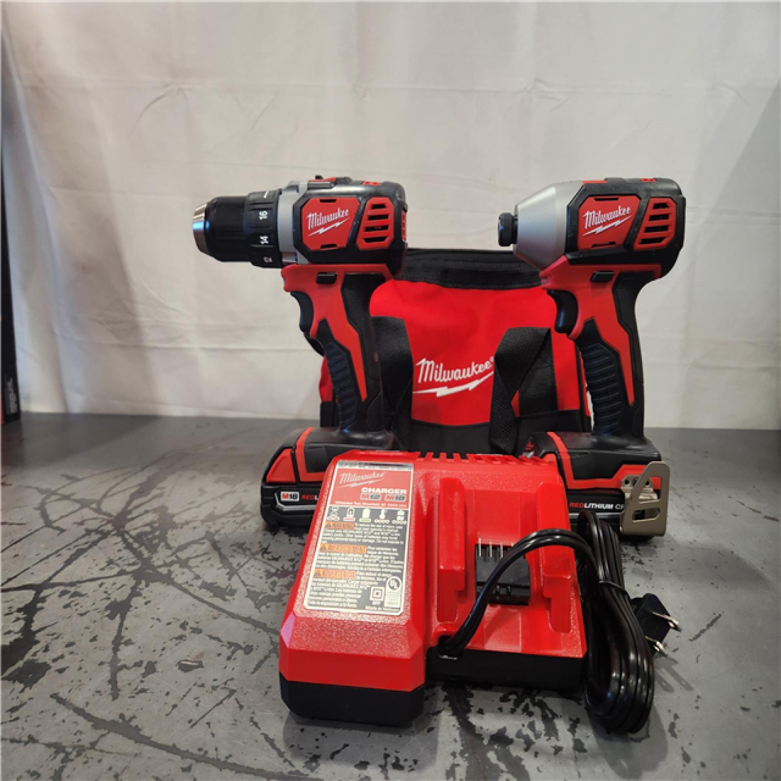 AS-IS- Milwaukee 18V Cordless Brushed 2-Tool Drill/Driver and Impact Driver Kit