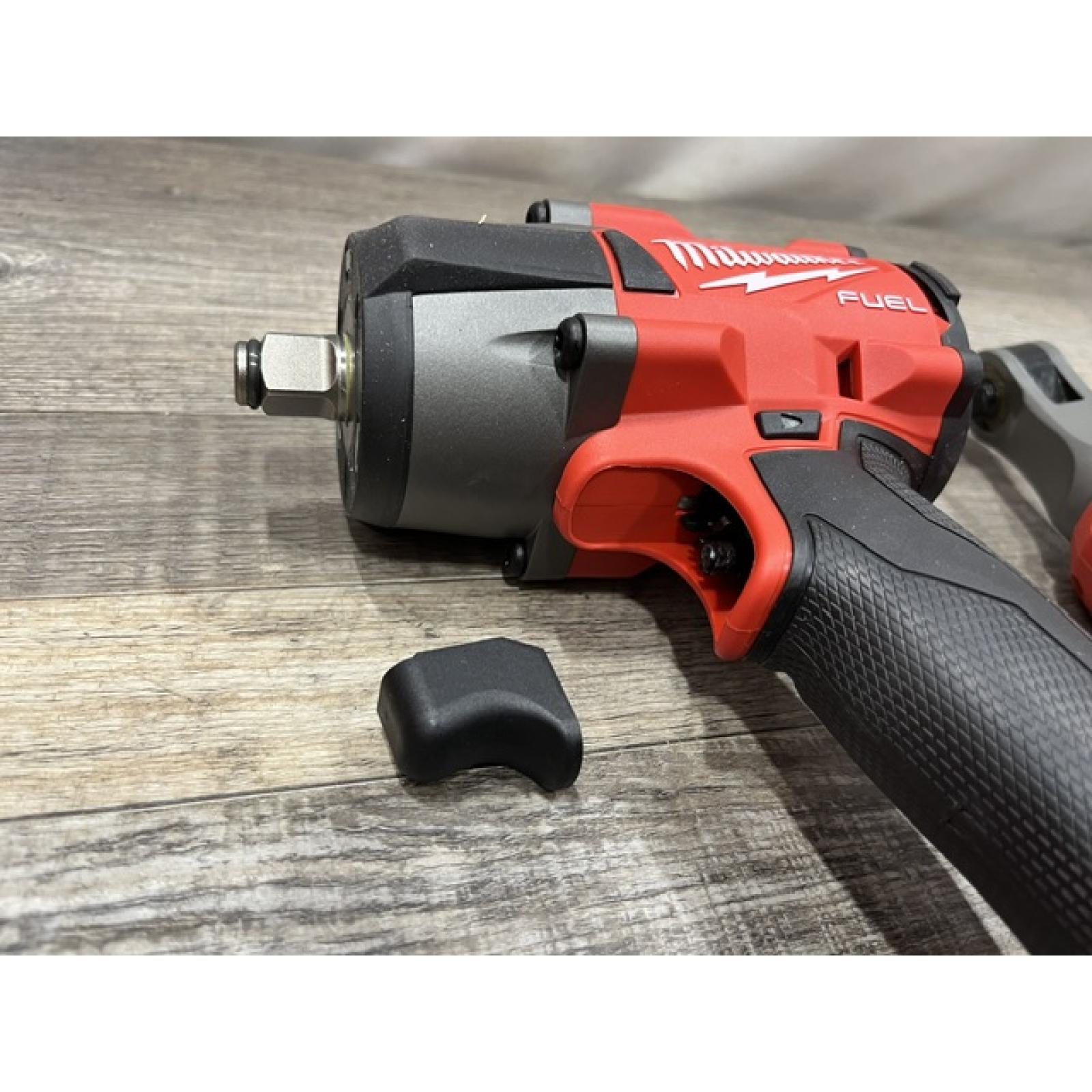 AS-IS Milwaukee FUEL 18V Cordless Mid Torque 1/2 in. Impact Wrench w/ 12 FUEL 3/8 in. Ratchet Combo Kit