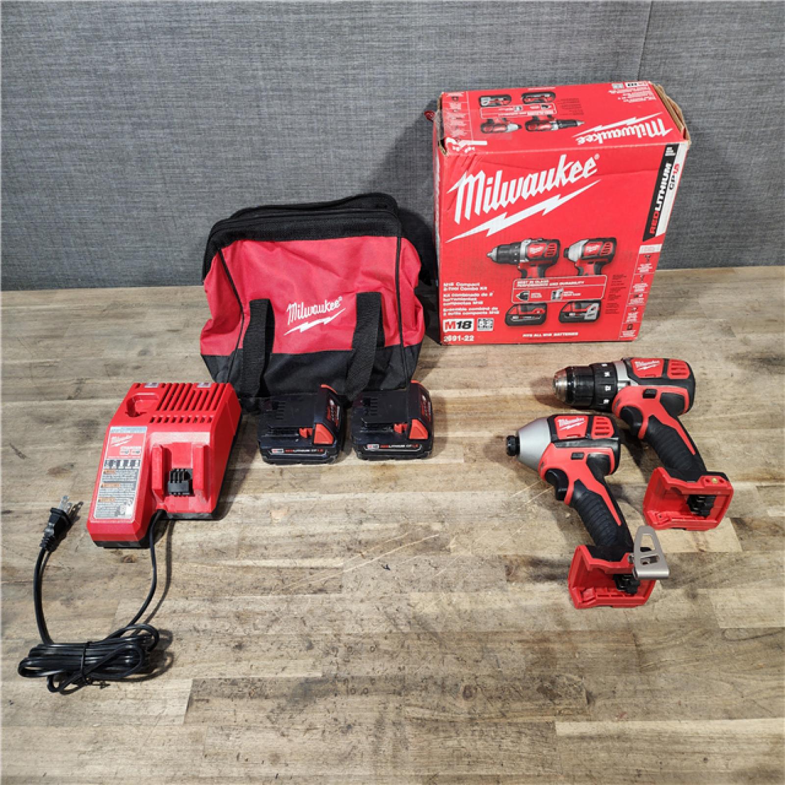 HOUSTON LOCATION - AS-IS Milwaukee M18 Brushed Cordless (2-Tool) Drill/Driver and Impact Driver Kit