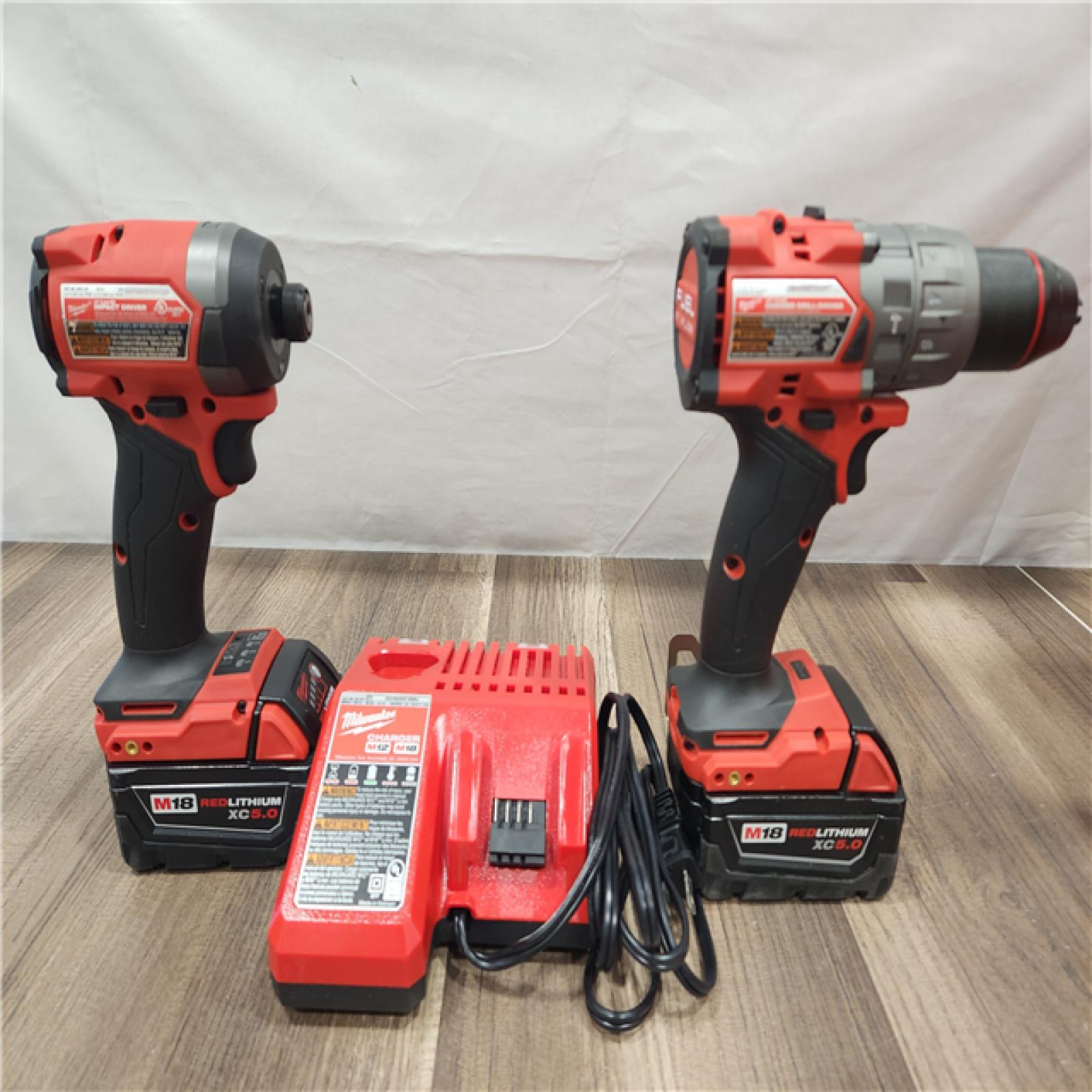 AS-IS- MILWAUKEE FUEL 18V Lithium-Ion Brushless Cordless Hammer Drill and Impact Driver Combo Kit