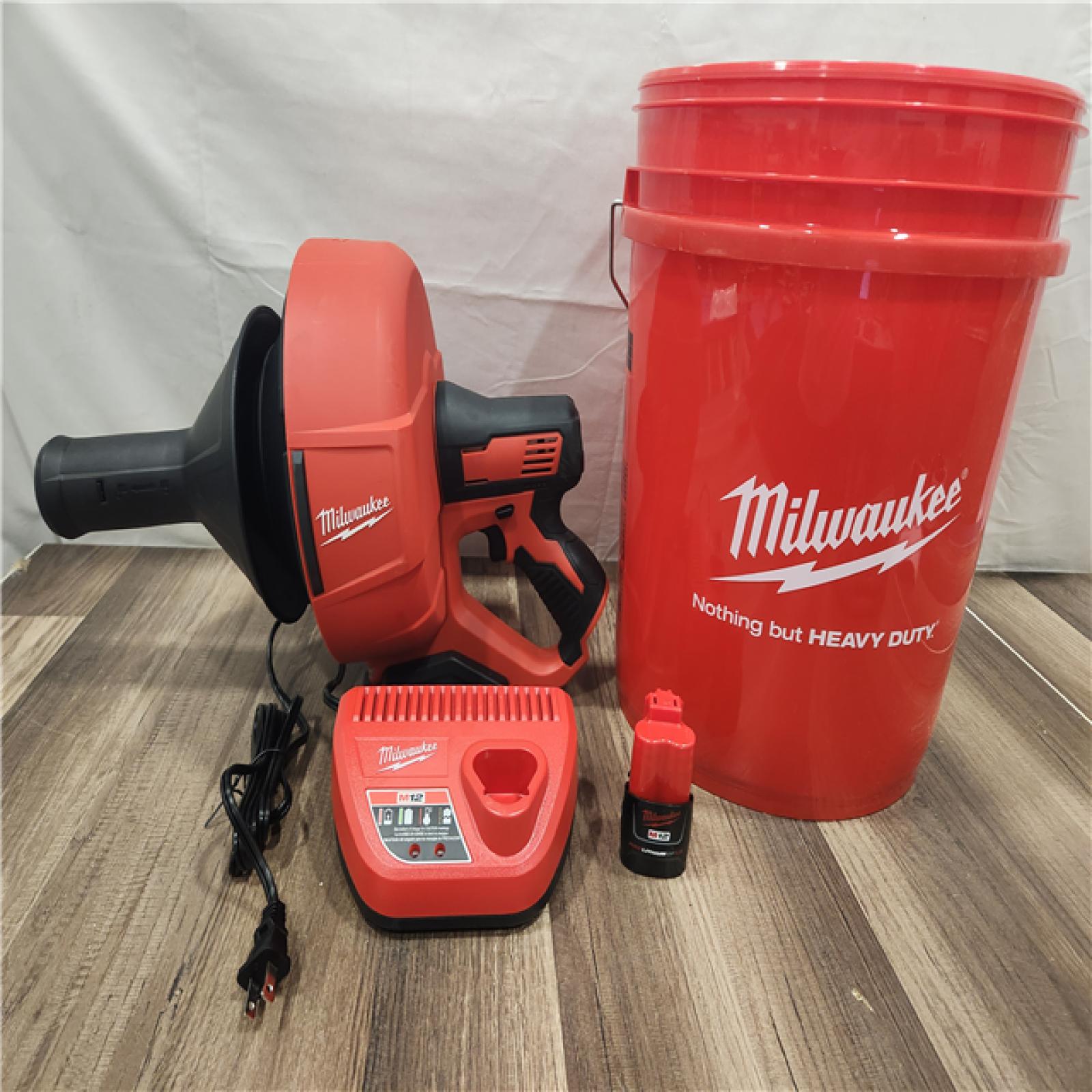 AS-IS- M12 12-V Lithium-Ion Cordless Drain Snake Auger W/ (1) 1.5Ah Battery  5/16 in. X 25 Ft. Cable  Charger  & 5 Gal. Bucket
