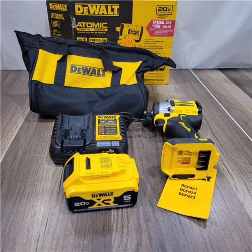 LIKE NEW! DEWALT ATOMIC 20V MAX Lithium-Ion Brushless Cordless 1/2 in. Variable Speed Impact Wrench Kit with 5 Ah Battery and Charger