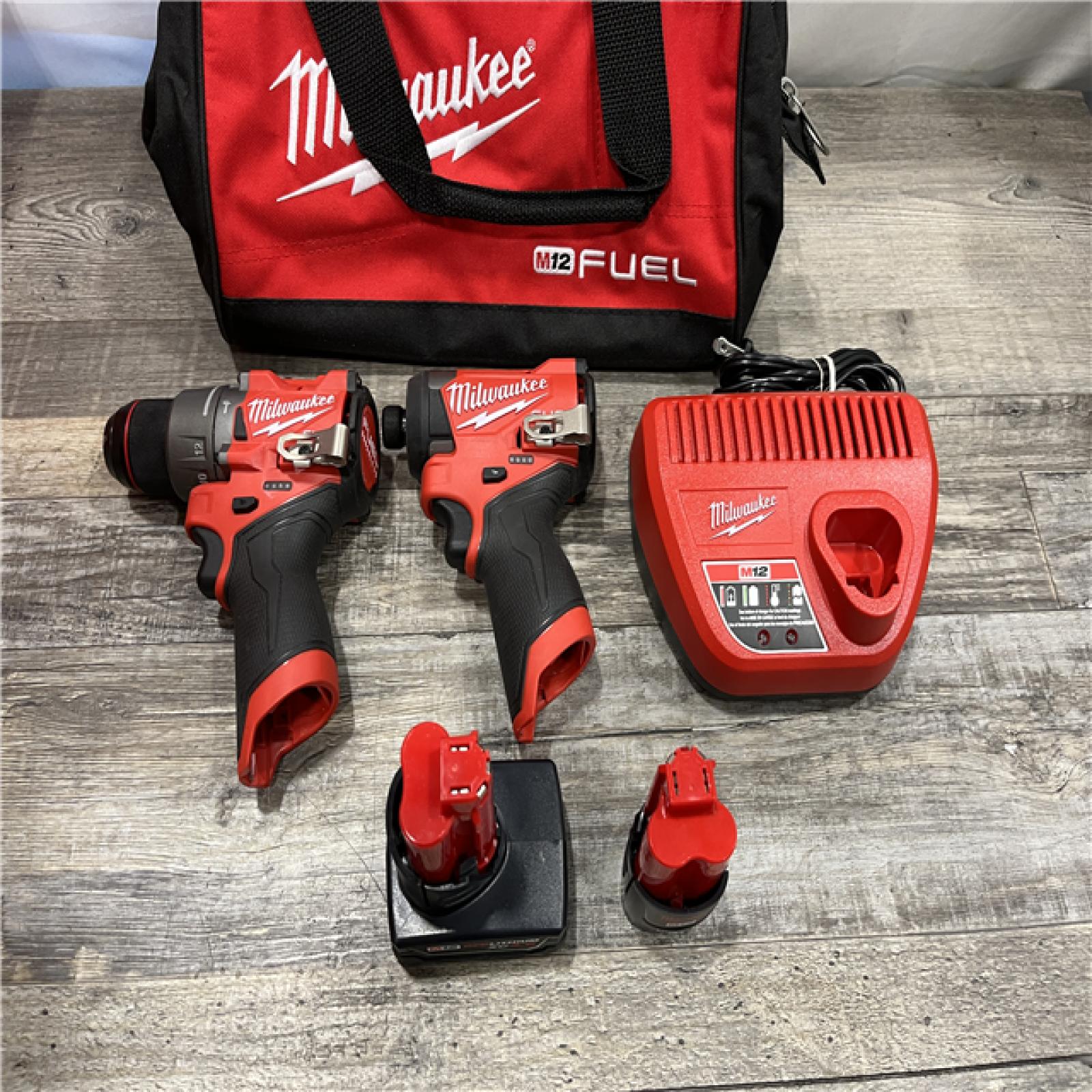 AS-IS Milwaukee FUEL 12-Volt Lithium-Ion Brushless Cordless Hammer Drill and Impact Driver Combo Kit