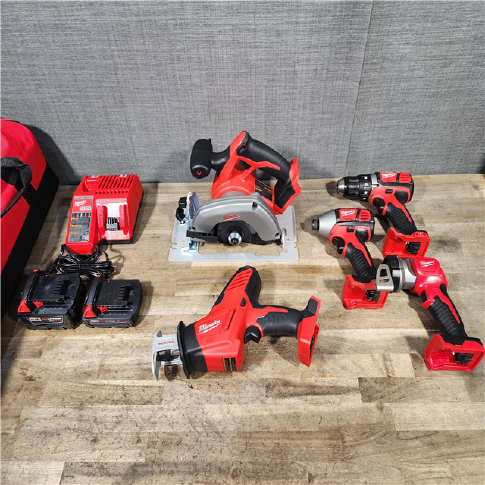 HOUSTON LOCATION - AS-IS (APPEARS LIKE NEW) M18 18V Lithium-Ion Cordless Combo Kit (5-Tool) with (1) 3.0Ah and (1) 1.5Ah Battery  (1) Charger  (1) Tool Bag