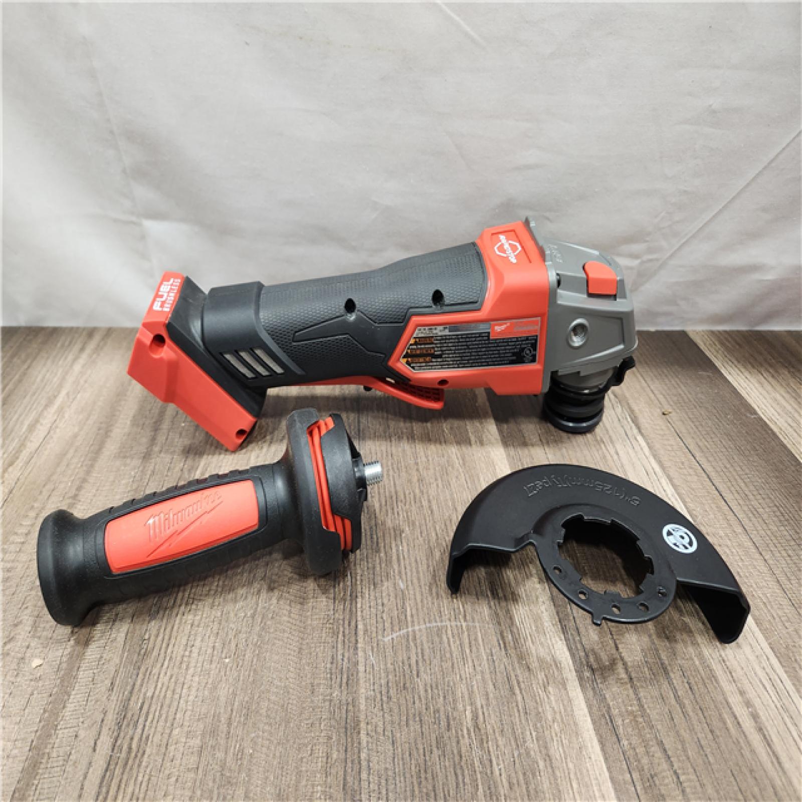 AS-IS- Milwaukee FUEL 18-Volt Lithium-Ion Brushless Cordless 4-1/2 in./5 in. Grinder W/Paddle Switch (Tool-Only)