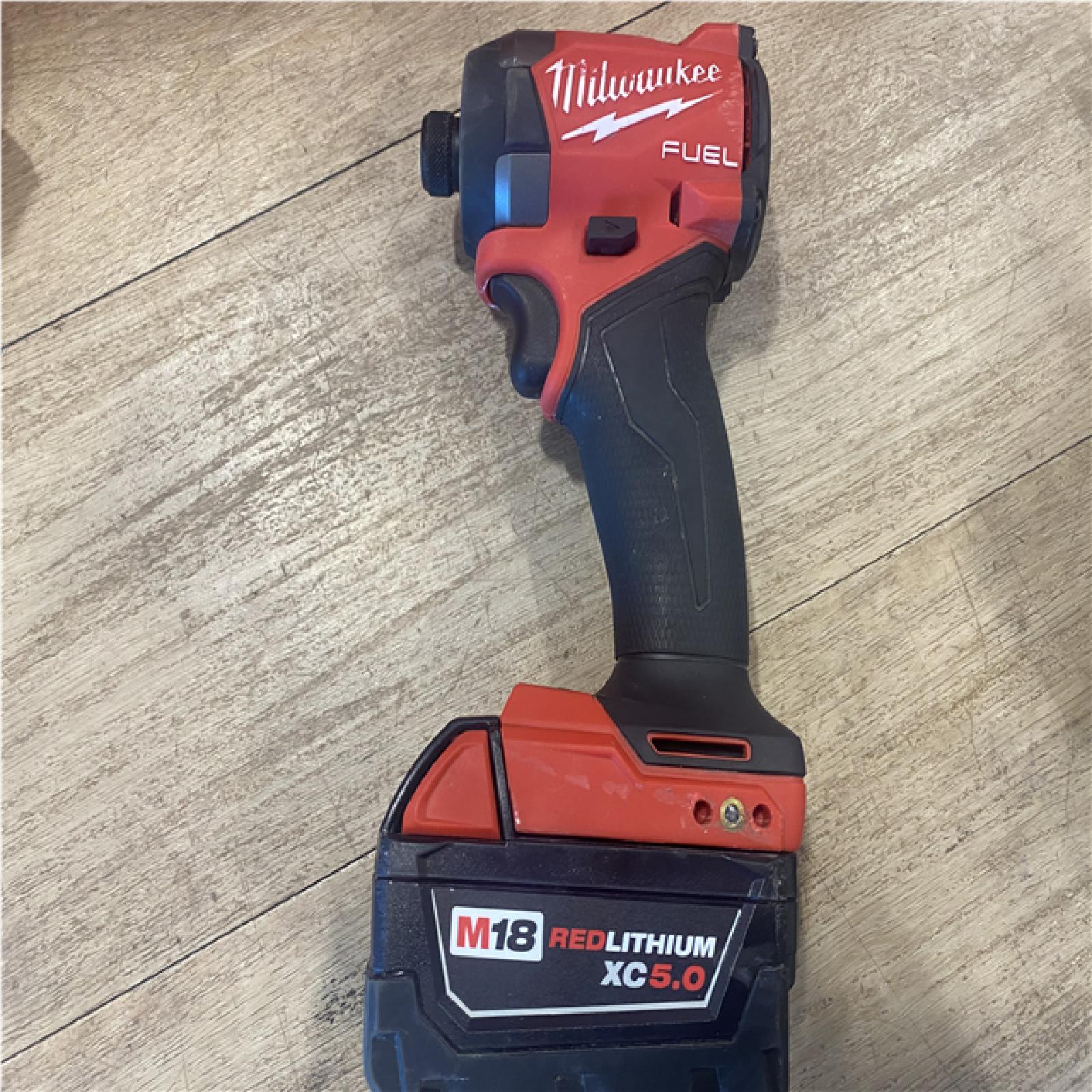 AS-IS Milwaukee FUEL 18V Lithium-Ion Brushless Cordless Hammer Drill and Impact Driver Combo Kit