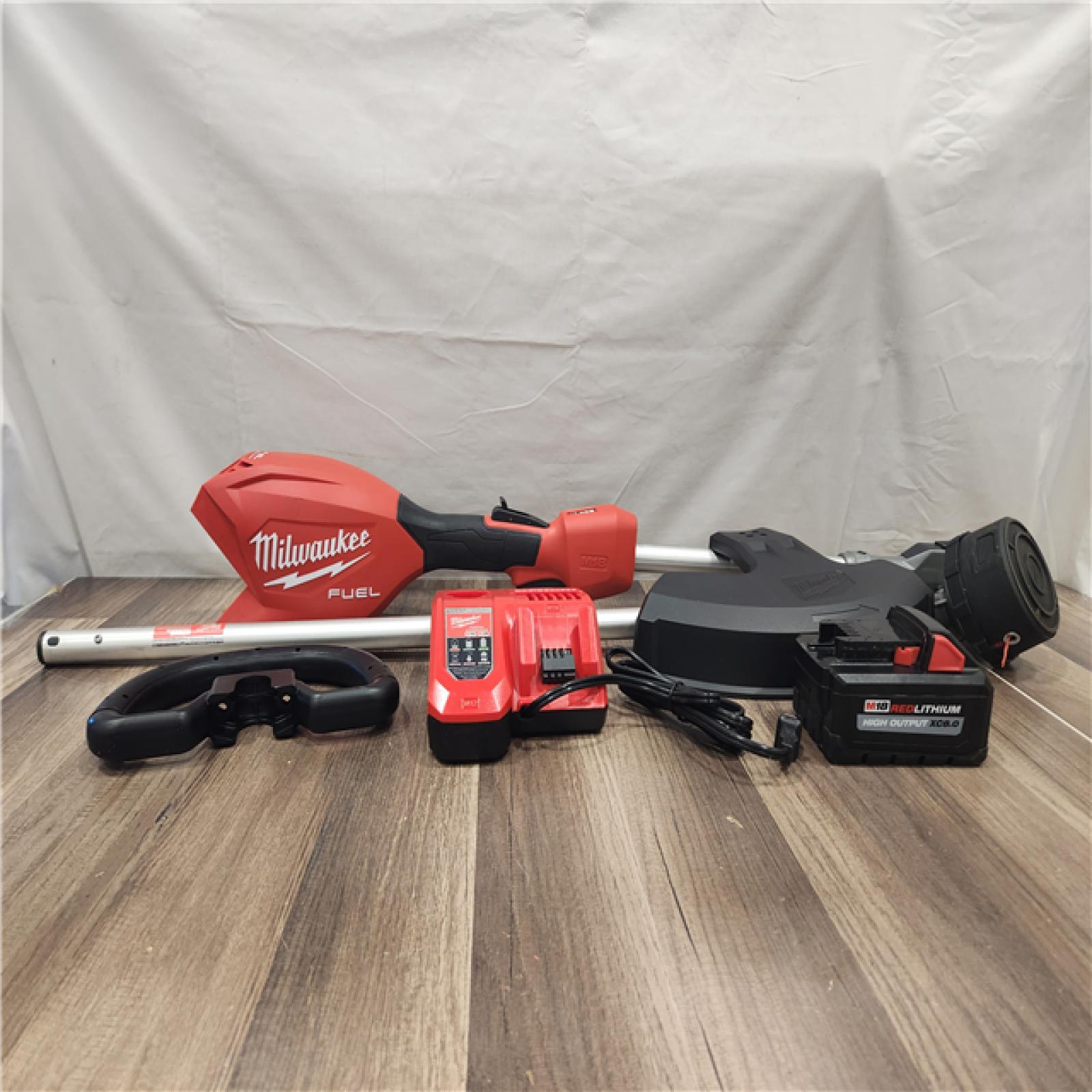 AS-IS- M18 FUEL 18V 16 in. Brushless Cordless Battery Powered String Trimmer W/QUIK-LOK Attachment Capability & 8.0 Ah Battery