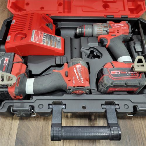 AS-IS  MILWAUKEE M18 FUEL 18V Lithium-Ion Brushless Cordless Hammer Drill and Impact Driver Combo Kit (2-Tool) with 2 Batteries