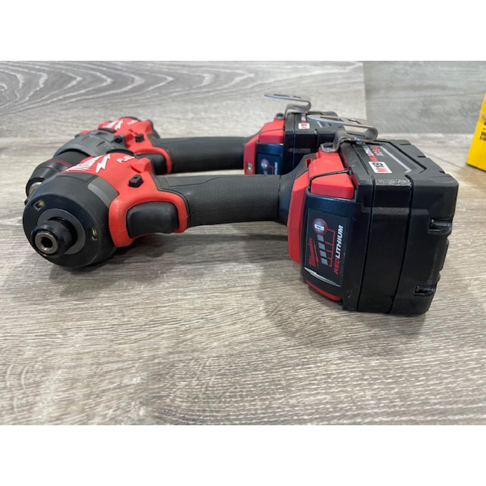 AS-IS Milwaukee FUEL 18V Lithium-Ion Brushless Cordless Hammer Drill and Impact Driver Combo Kit