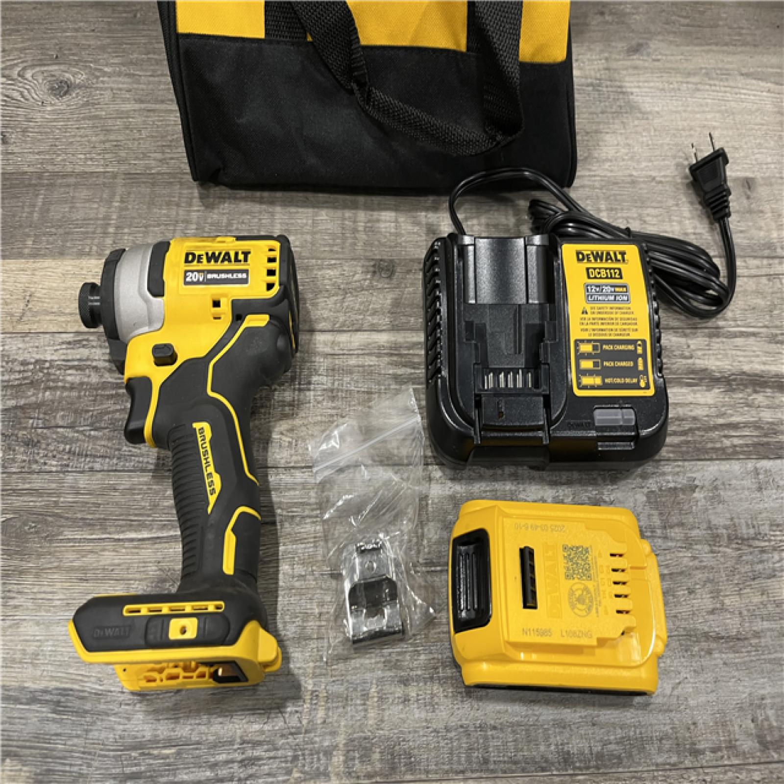 AS-IS DEWALT Atomic 20V Max Lithium-Ion Brushless Cordless Compact 1/4 in. Impact Driver Kit